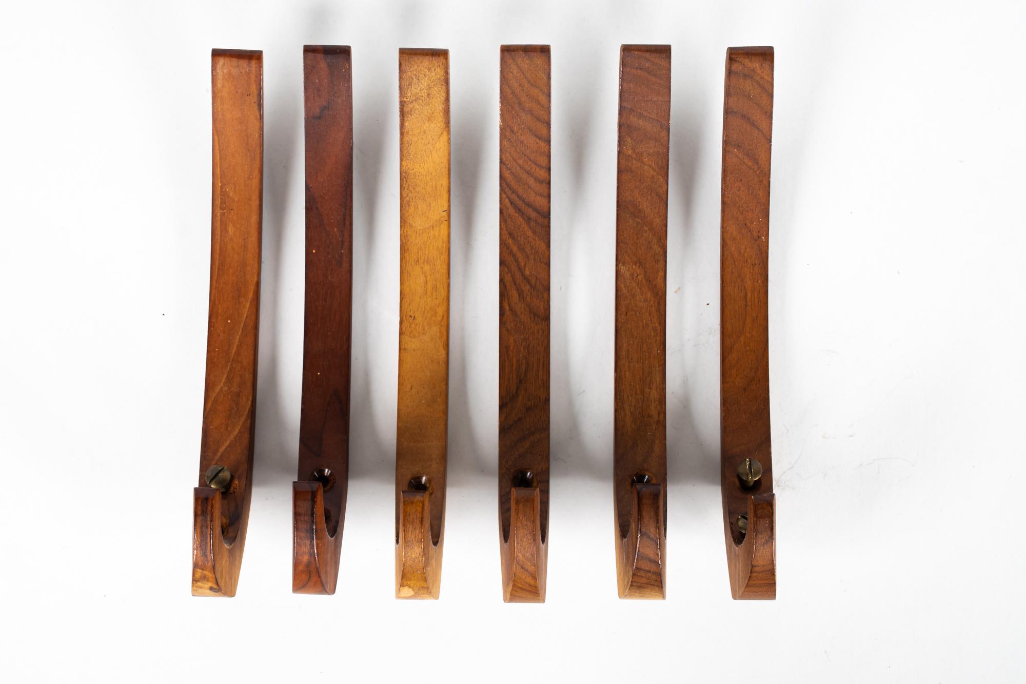 6 wall hooks rosewood vienna around 1960s
Original screws
Original condition.
 