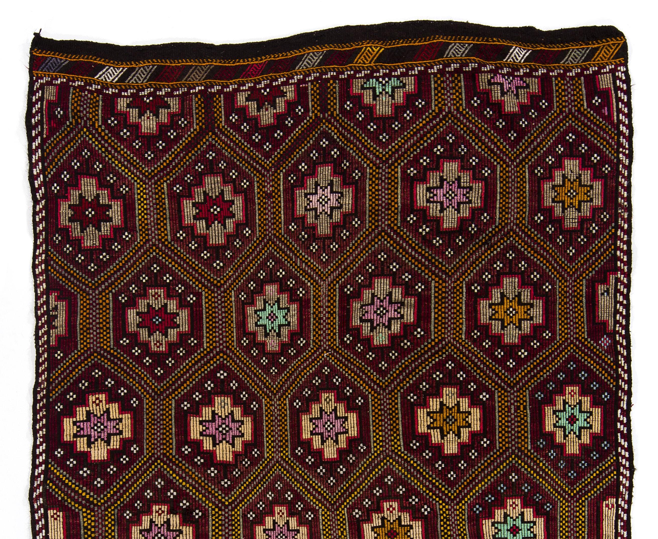 This type of Kilims (flat-woven rugs) were produced by nomads in South Central Turkey around midcentury for daily use in their tents rather than re-sale or export purposes and today they are very popular in western interior design world for their
