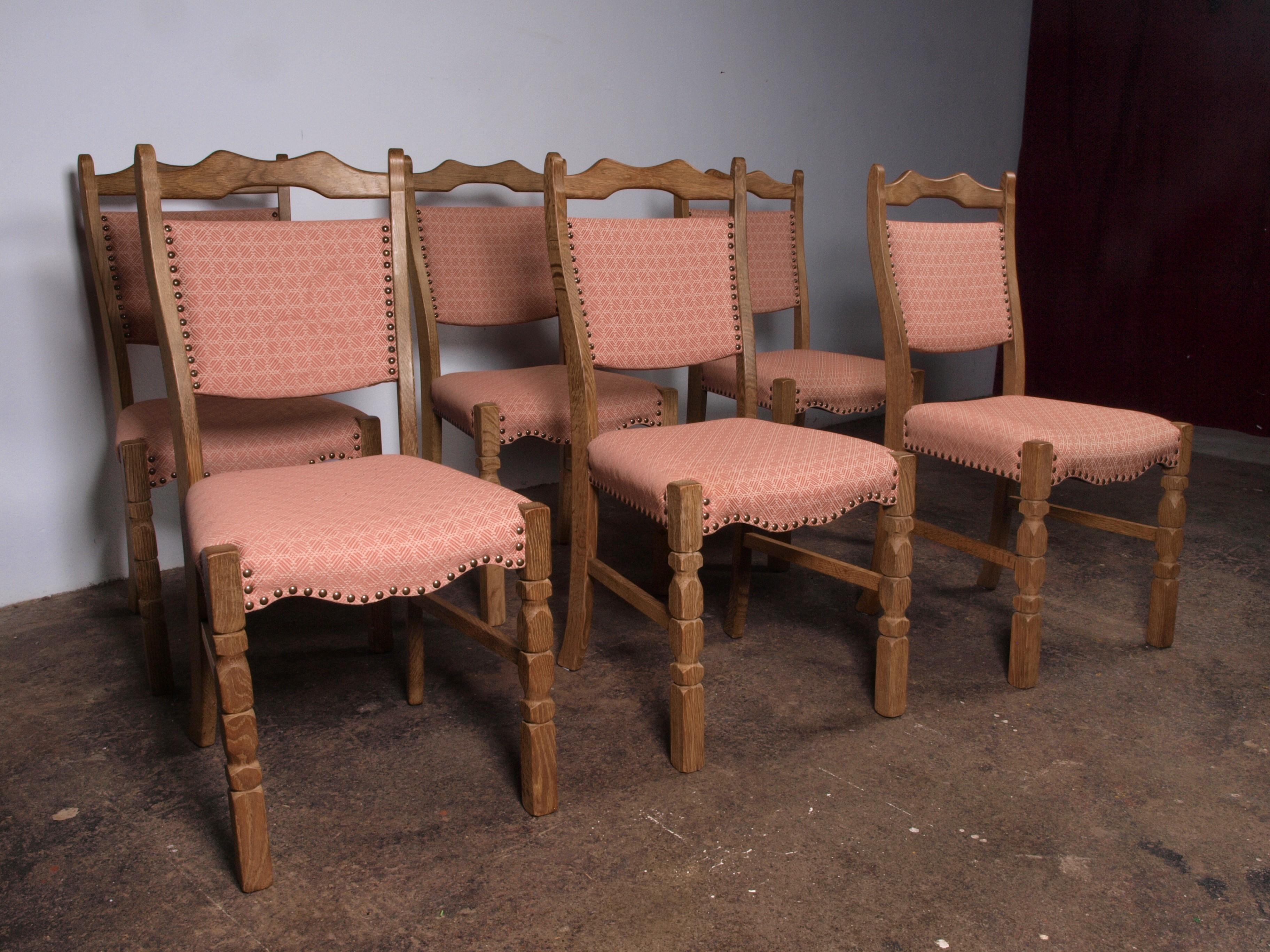 a set of 6 beautiful and well kept oak dining chairs from Denmark 1960s. They are made of solid Oak wood in the style of Henning Kjærnulf. They are all solid and firm, and the fabric is in very good condition with no stains or smell.

Can be shipped