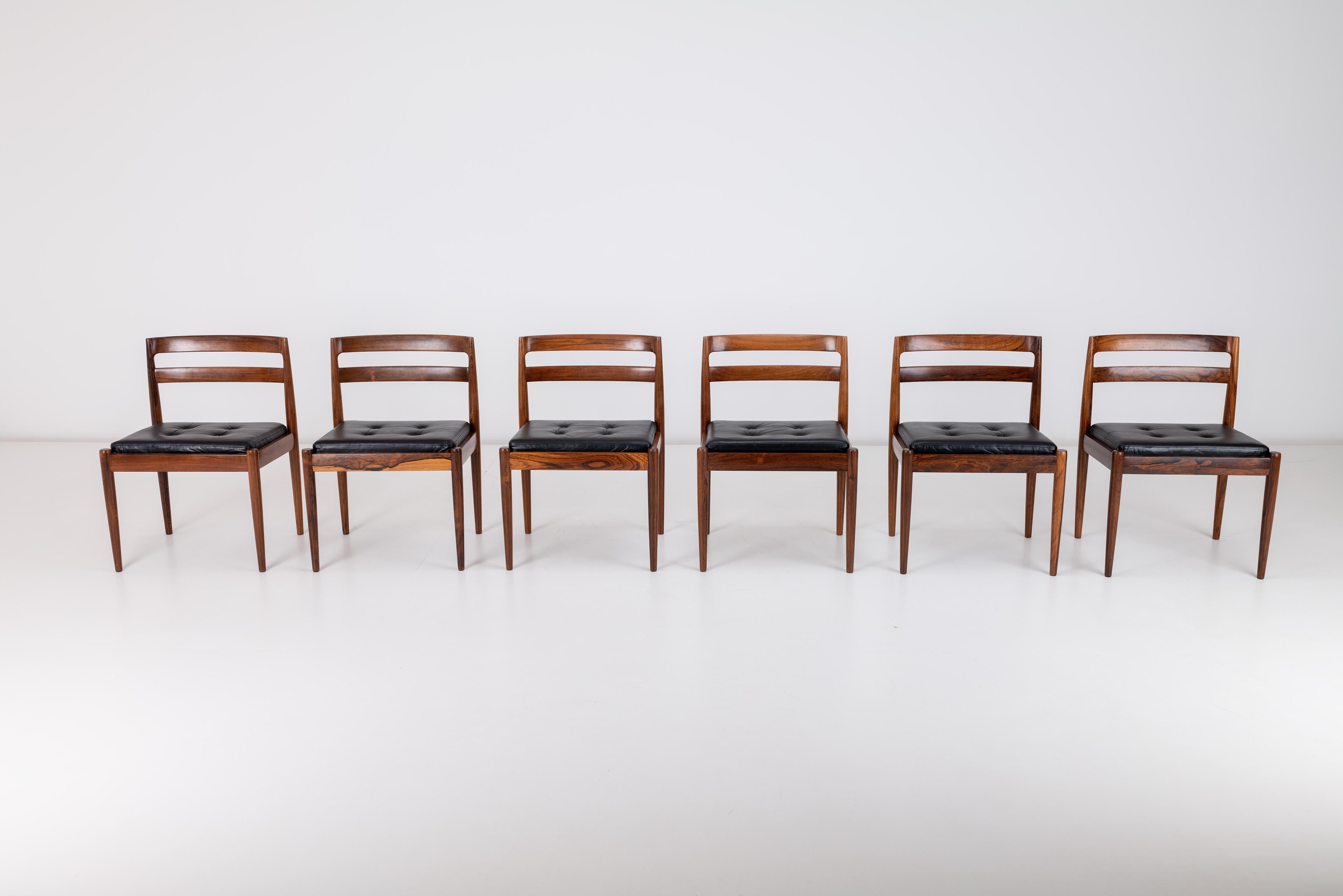 We have for sale a fantastic set of six, Model 301 dining chairs by Kai Kristiansen for Magnus Olesen, Denmark. Chairs are marked and labelled accordingly. 

The chairs are very elegant, very beautiful chairs. The chairs are made from figurative