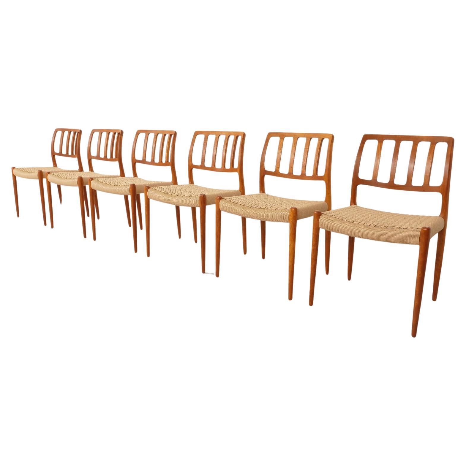 6 x Niels Otto Møller dining chairs  Model 83  Papercord  Teak  Restored For Sale