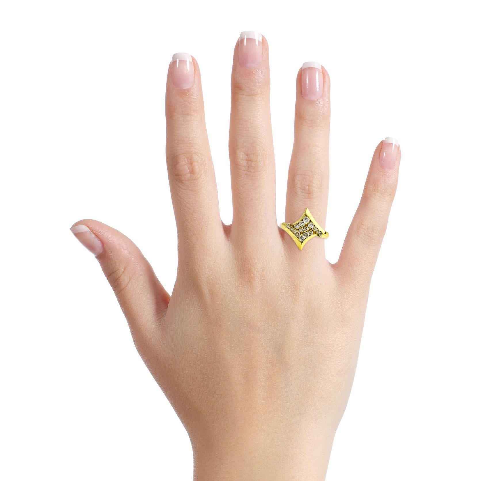 Diamond fashion ring in 18-karat yellow gold. The ring is prong set with 16 brilliant round cut natural diamonds. 

Size, 7
Weight, 7.8 grams
Height, 7mm
Width, 18 - 3mm
Diamond total carat weight, .60 carat. 