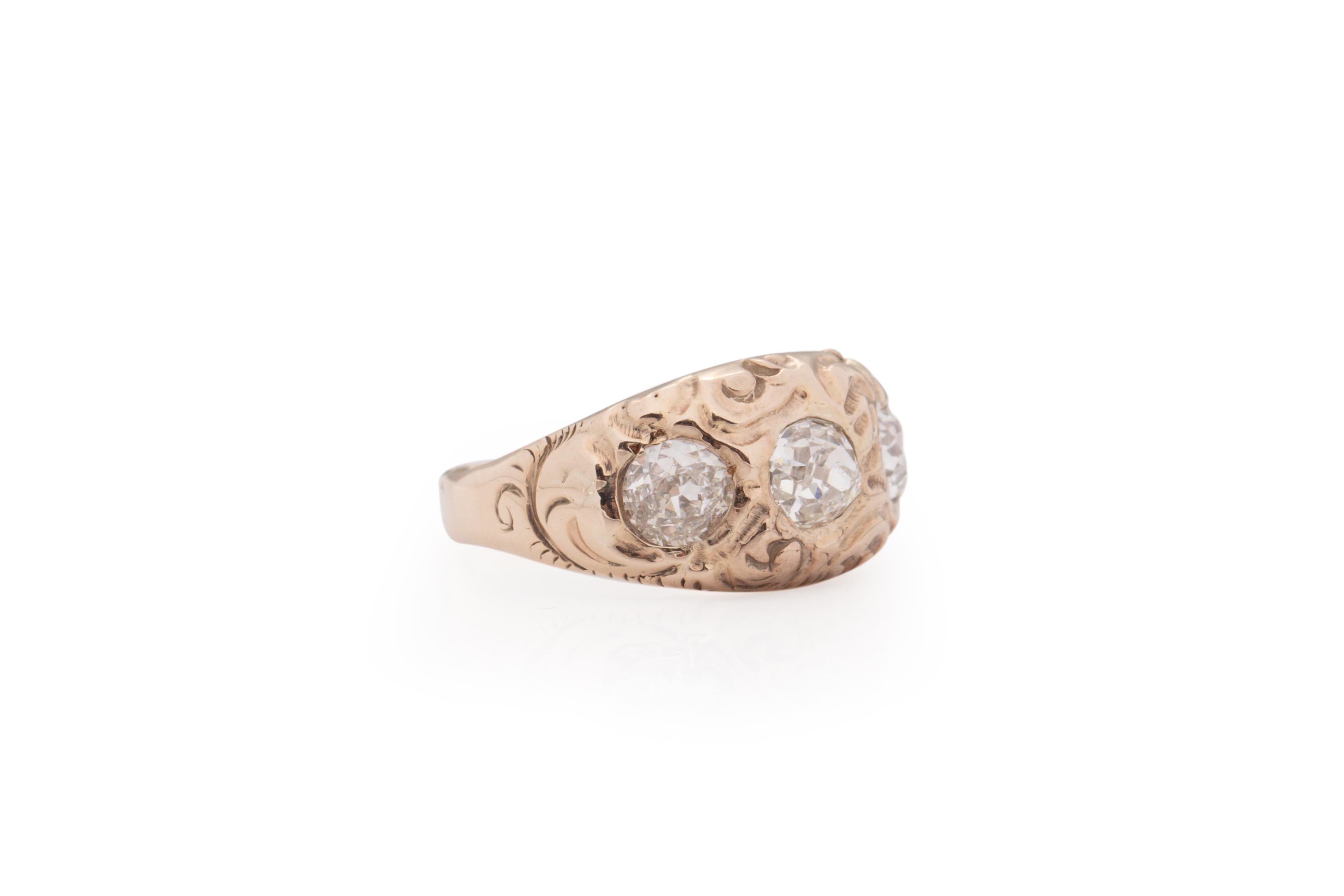 Ring Size: 5.5
Metal Type: 14 Karat Yellow Gold [Hallmarked, and Tested]
Weight: 4.6 grams

Center Diamond Details:
Weight: .60 carat
Cut: Old Mine Brilliant
Color: I
Clarity: VS2

Side Stone Details:
Weight: 1.00 carat, total weight (2