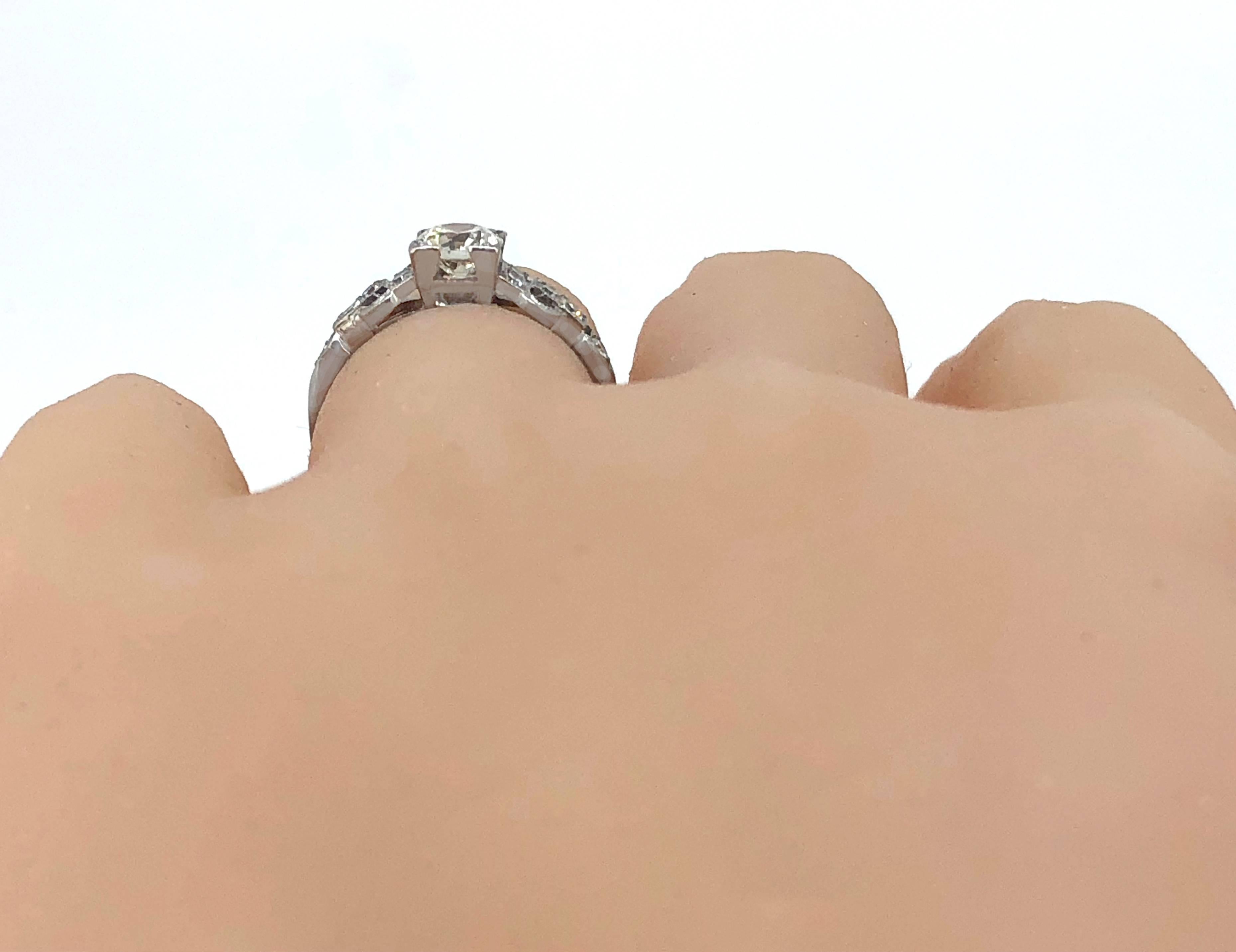 Round Cut .60 Carat Diamond Antique Engagement Ring Platinum For Sale