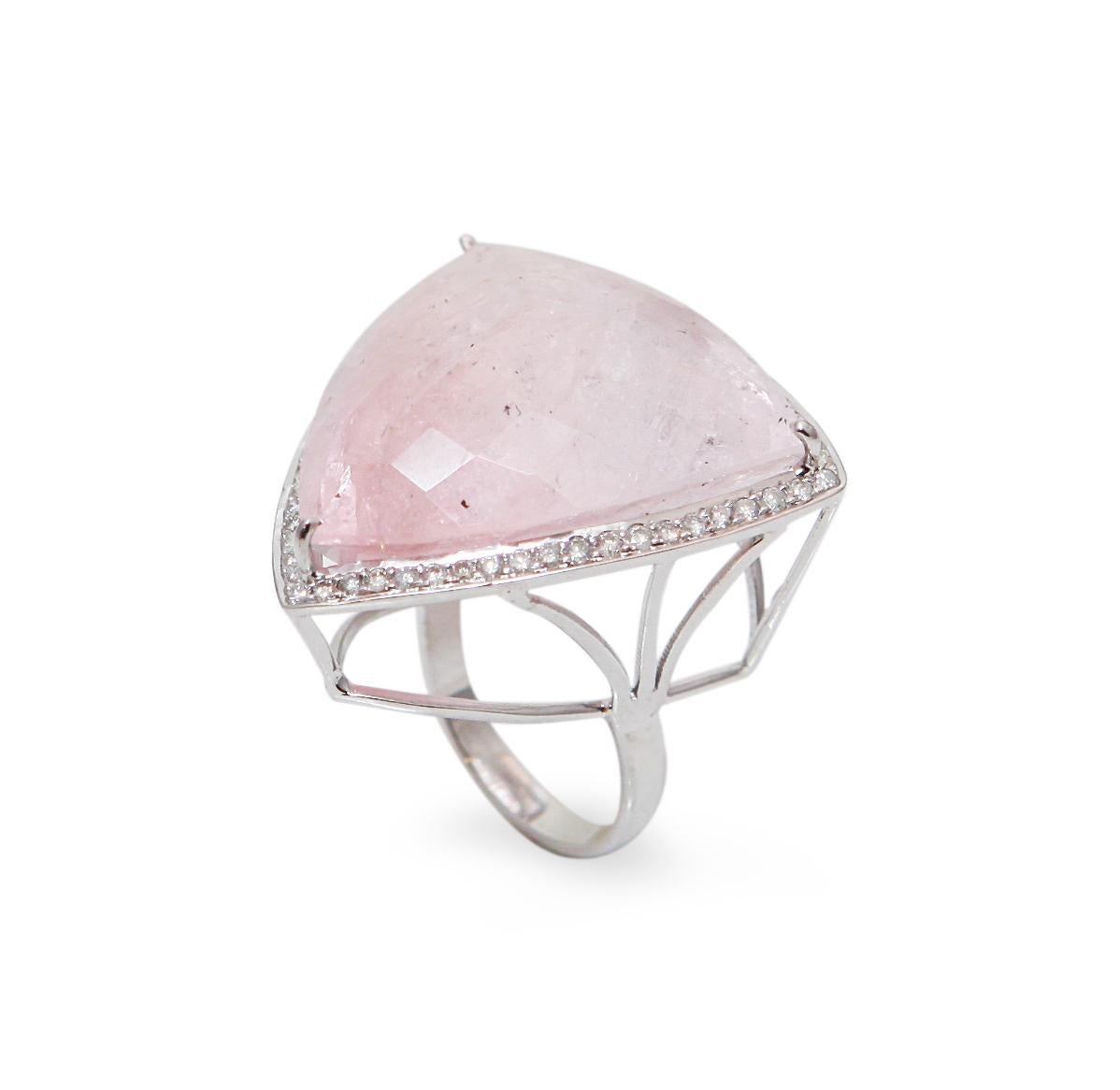 Important and rare cocktail ring presenting a central Troidia morganite entirely set with diamonds.

18K white gold, 750 / 1000th

Morganite weight: 60 carats

Deep pink color.

Dimensions: 32 X 32mm (1.26 x 1.26 inch) 

Diamonds weight: 0.90