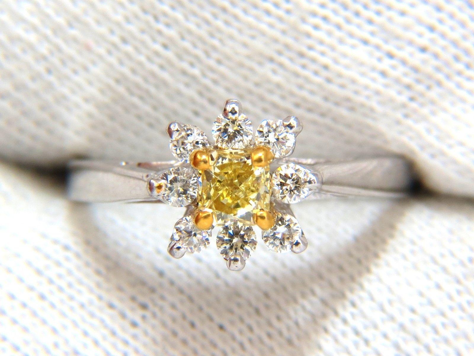 Fancy Yellow Cluster Ring

Petite Deco

.40ct. Natural Yellow Diamond

Princess Cut

Si-1 clarity

3.7 X 3.6mm



Side diamonds:

.20ct.

rounds, Full cuts.

H-color Si-1 clarity

  14kt. white gold

2.2 grams

Ring Current size: 6 

(Free Resize