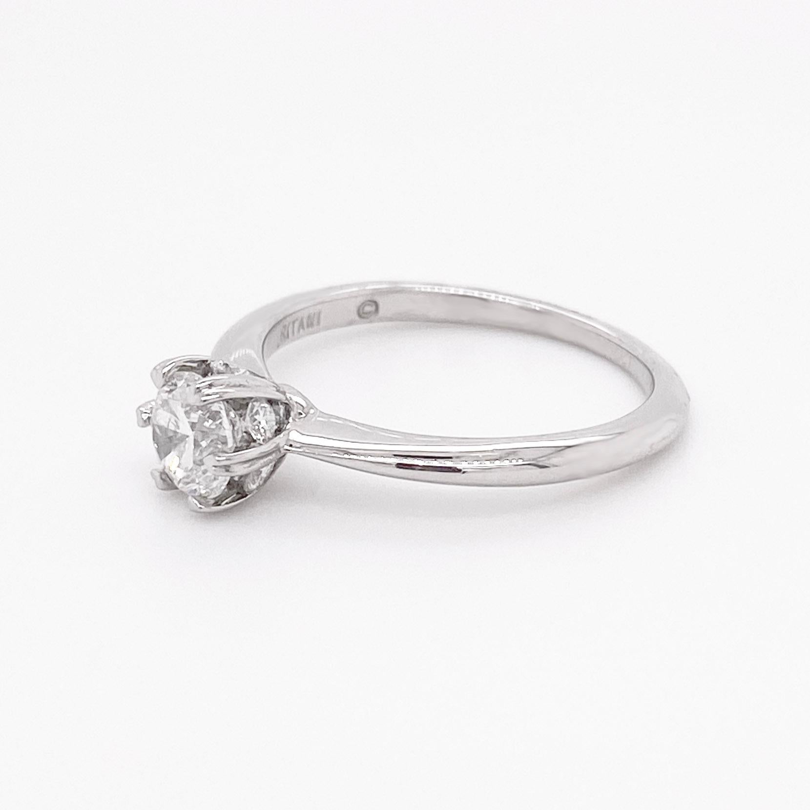 Moderne .60 Carat Round Diamond Platinum Solitaire Hidden Halo and Heart Prongs en vente