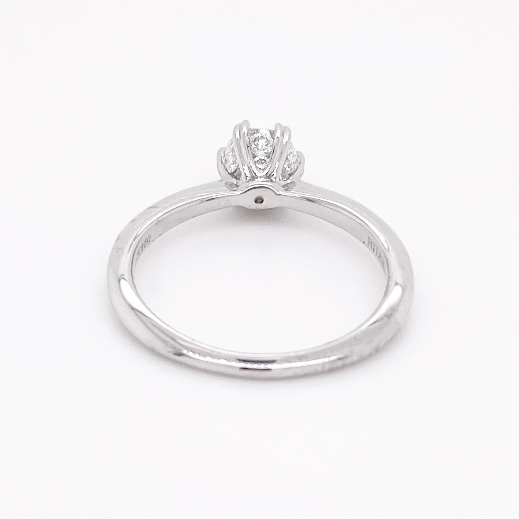 Modern .60 Carat Round Diamond Platinum Solitaire Hidden Halo and Heart Prongs For Sale