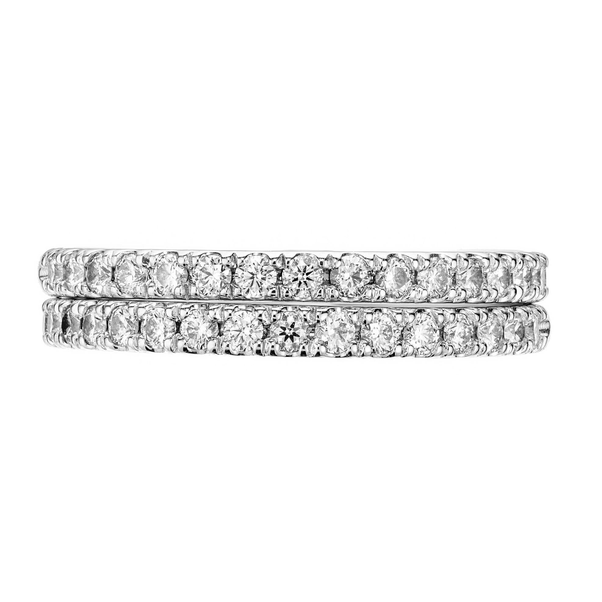 Double diamond wedding band rings. 34 round cut diamonds H-I (Near colorless) color and VS-SI clarity total weight .60cts. Set in two platinum settings. These rings came along with a Hearts on Fire engagement ring that we have listed, however the