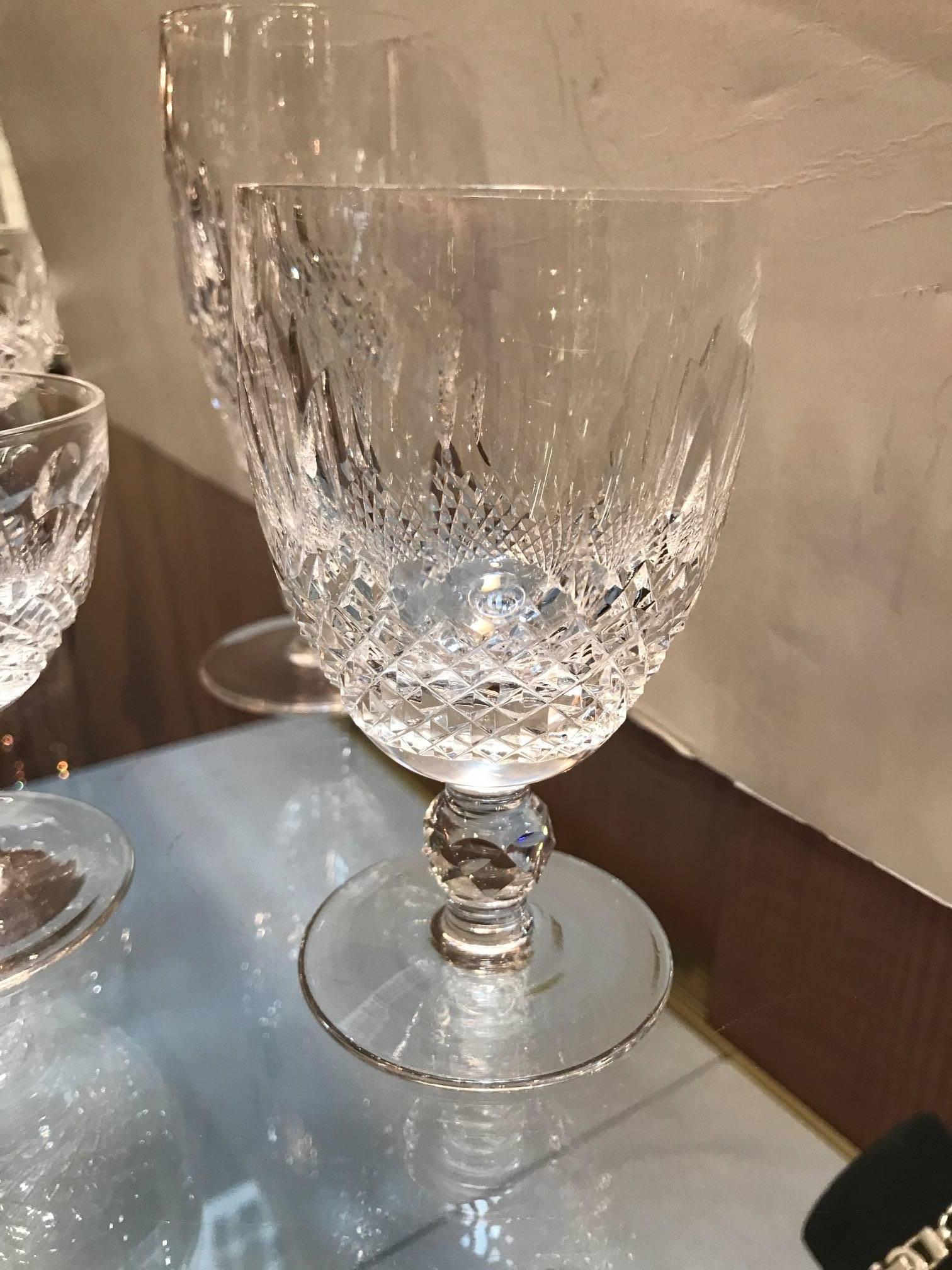 An extensive set of Waterford Irish crystal with 12 pcs of 5 sized stems. This is the original Waterford hand cut and polished crystal by master glass cutters for Waterford The pattern is the most desirable Colleen pattern. 

12-6 in. fluted