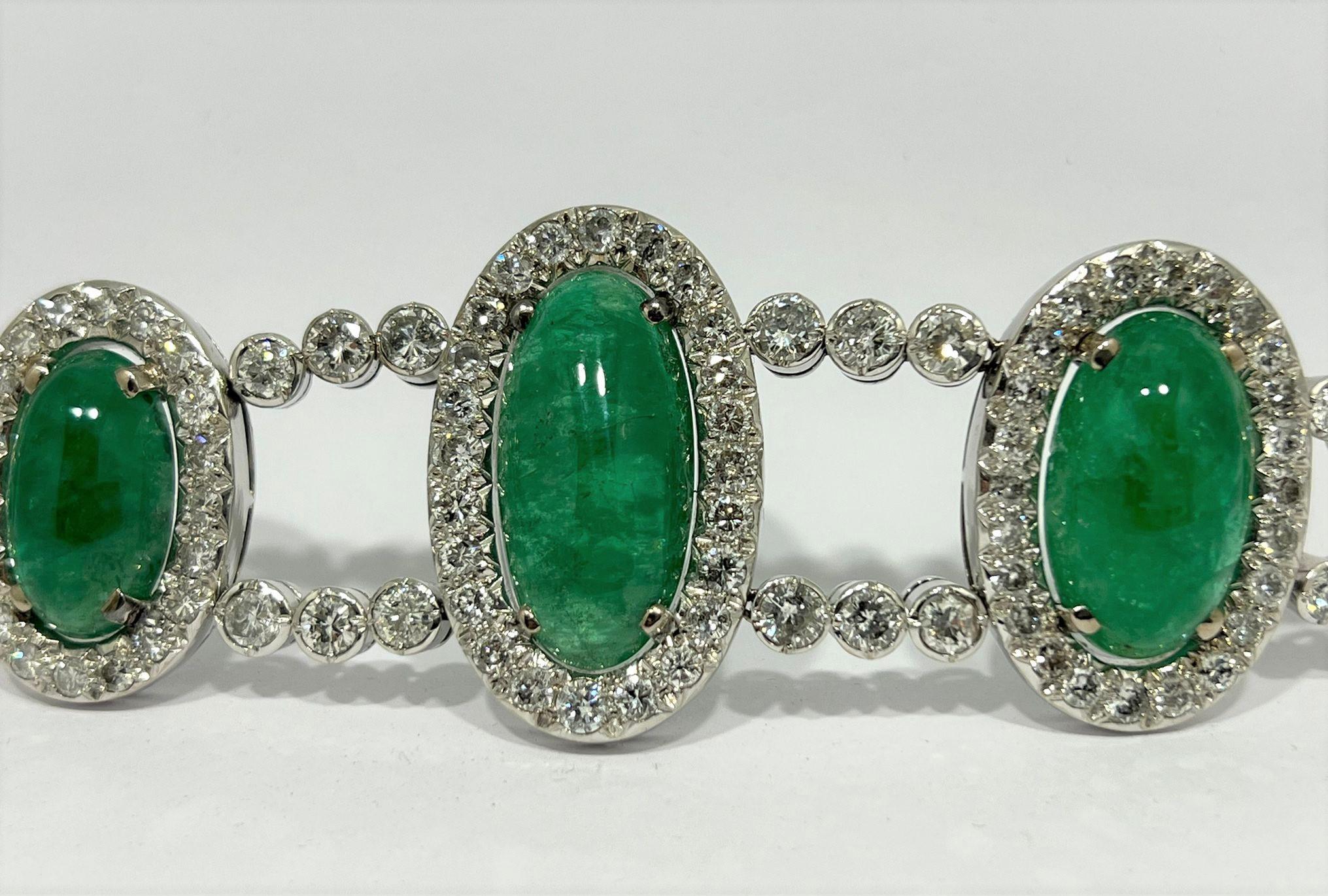 Beautiful and Finely elaborate 60´s Cabouchon Emerald Bracelet in 18k white gold 
 with 5 colombian emeralds of beautiful colour which total  72ct 
and 120  diamonds colour I and brilliant cut which total 20cts
Length  18,5 / 7,28 inches     width