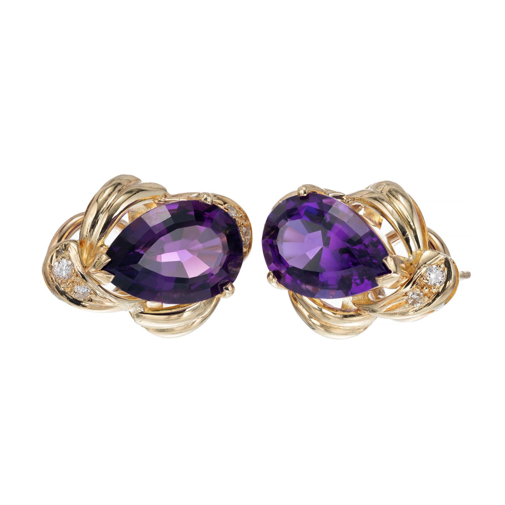 Purple pear shaped amethyst and diamond clip post 14k yellow gold earrings.

2 pear shaped purple amethyst , approx. total weight 6.00cts 
8 round brilliant cut diamonds J VS, approx. .12cts
14k yellow gold 
Stamped: 14k
8.1 grams
Top to bottom: