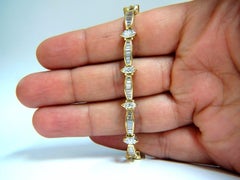 Bracelet « tennis » de 6,00 carats avec diamants taille baguette et marquise, en or 18 carats, G/Vs*