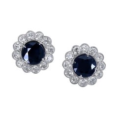 6.00 Carat Blue Sapphire and Diamond Halo Flower Stud Earrings