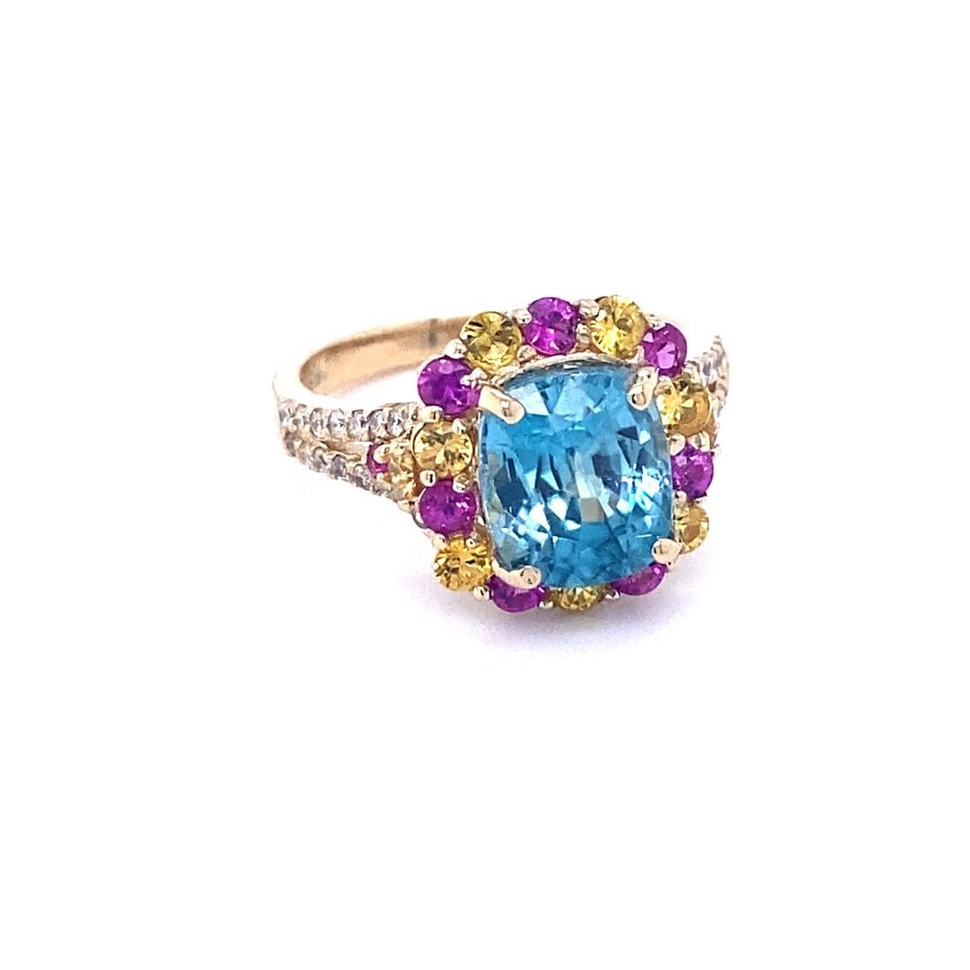6.00 Carat Zircon Sapphire Diamond Yellow Gold Engagement Ring

A Dazzling Blue Zircon, Pink, Yellow Sapphire and Diamond Ring! 
Blue Zircon is a natural stone mined in different parts of the world, mainly Sri Lanka, Myanmar, and Australia. 

This