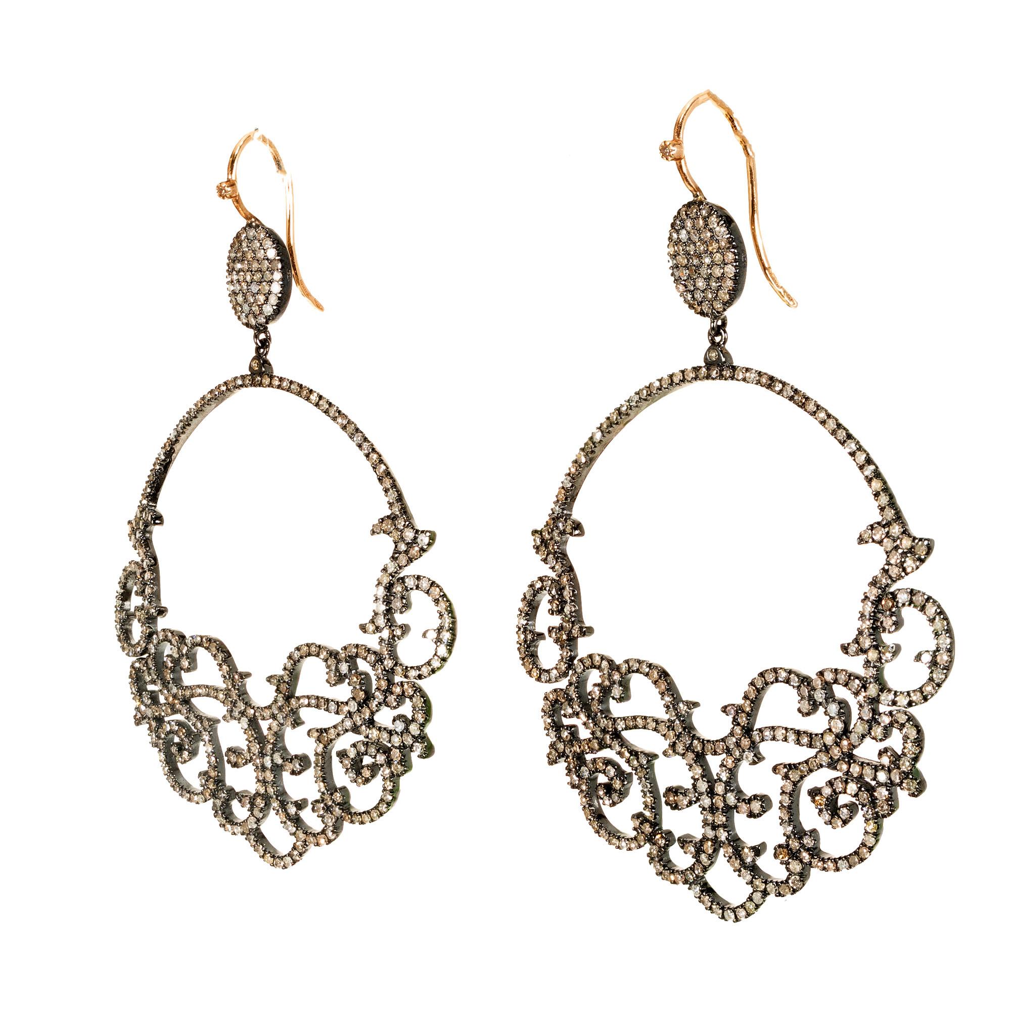 Open scroll diamond chandelier earrings. 762 single cut diamonds set in black rhodium fusion silver with 18k rose gold wires. 

762 single cut diamonds, I-K I, I2 approx. 6.00cts 
18k white gold 
Silver
Tested: 18k
16.1 grams
Length: 73.07mm and