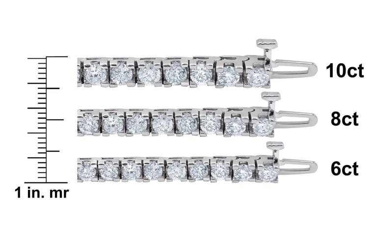Timeless four prong diamond tennis bracelet:
- 6.00 Carats of Round Brilliant Cut Diamonds
-G-H in Color, SI I in Clarity
- 100% eye clean diamonds

