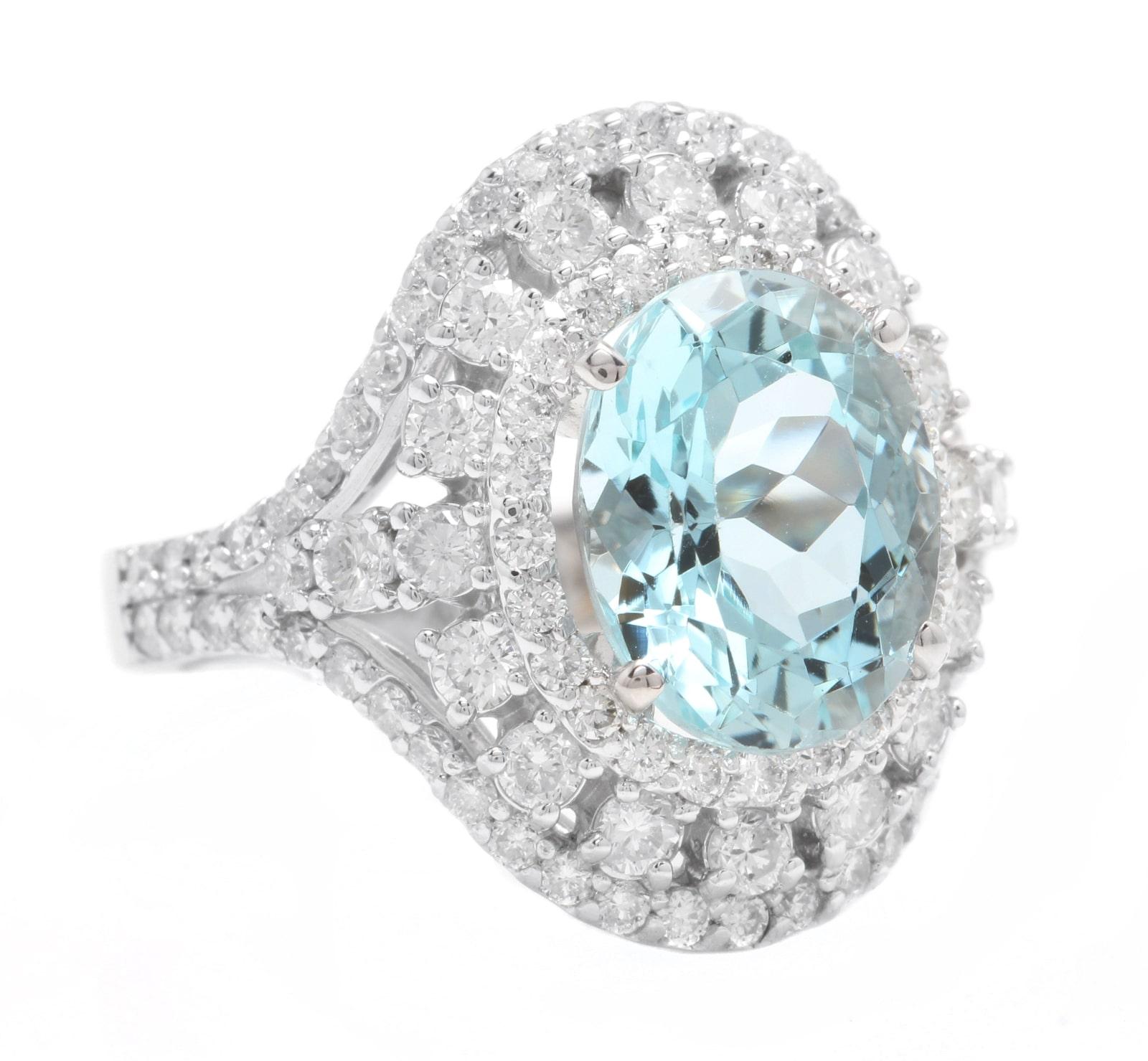 6.00 Carats Natural Aquamarine and Diamond 14K Solid White Gold Ring

Total Natural Oval Cut Aquamarine Weights: 4.00 Carats

Aquamarine Measures: 11.00 x 9.00mm

Natural Round Diamonds Weight: 2.00 Carats (color G-H / Clarity SI1-SI2)

Ring size: 6
