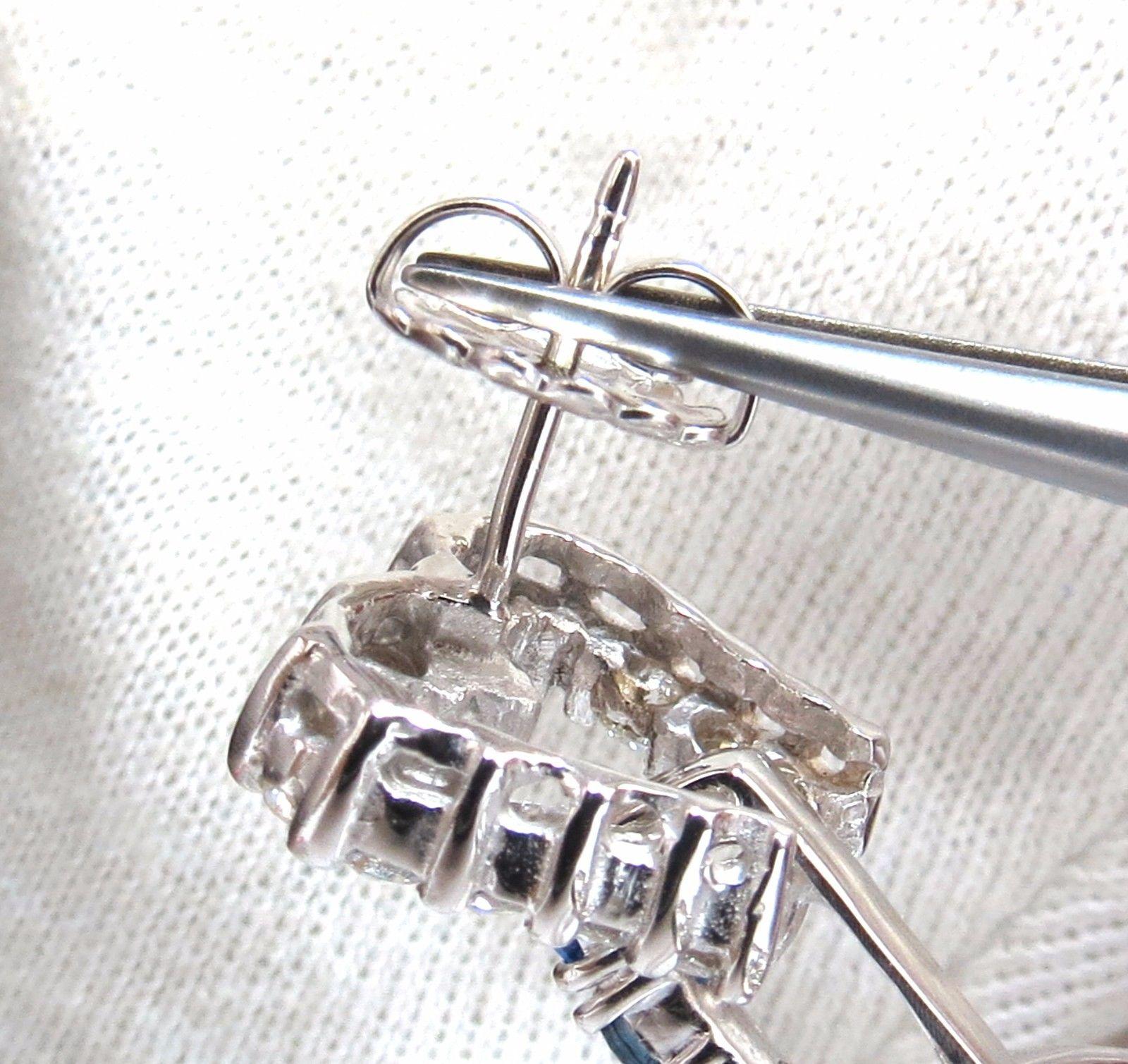 Saphir, diamants Boucles d'oreilles pendantes circulaires à 3 niveaux.

3.50ct de saphirs bleus royaux naturels

coupe ronde, clarté nette et transparente.

2.50ct de diamants ronds.

Couleur H, clarté Vs-2.

or blanc 14kt

25.5 grammes.

Mesure des