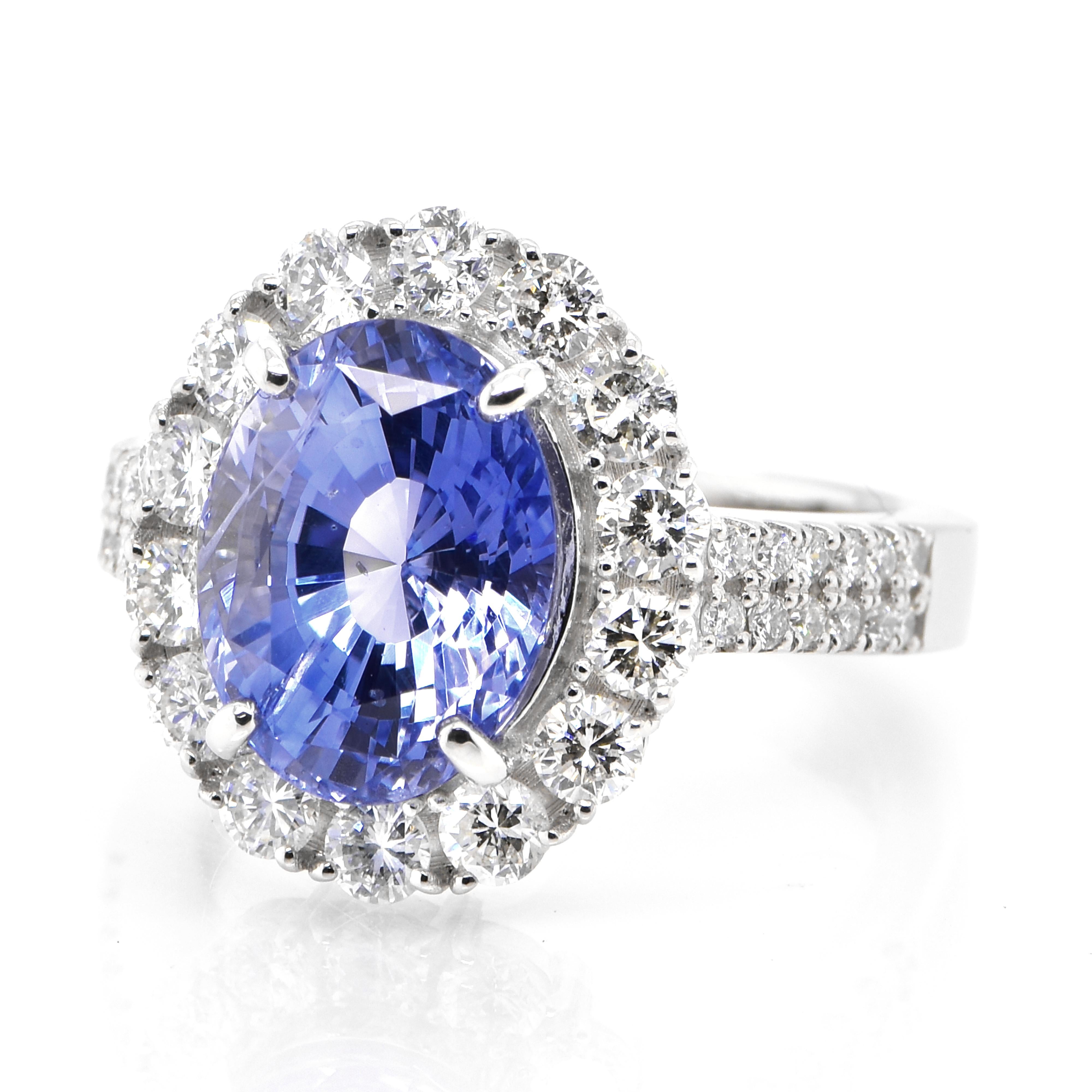A beautiful ring featuring 6.006 Carat Natural Unheated Sapphire and 1.27 Carats Diamond Accents set in Platinum. Sapphires have extraordinary durability - they excel in hardness as well as toughness and durability making them very popular in