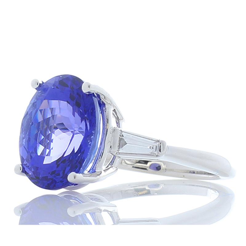 Contemporary 6.00 Carat Oval Tanzanite and Tapered Baguette Diamond White Gold Cocktail Ring