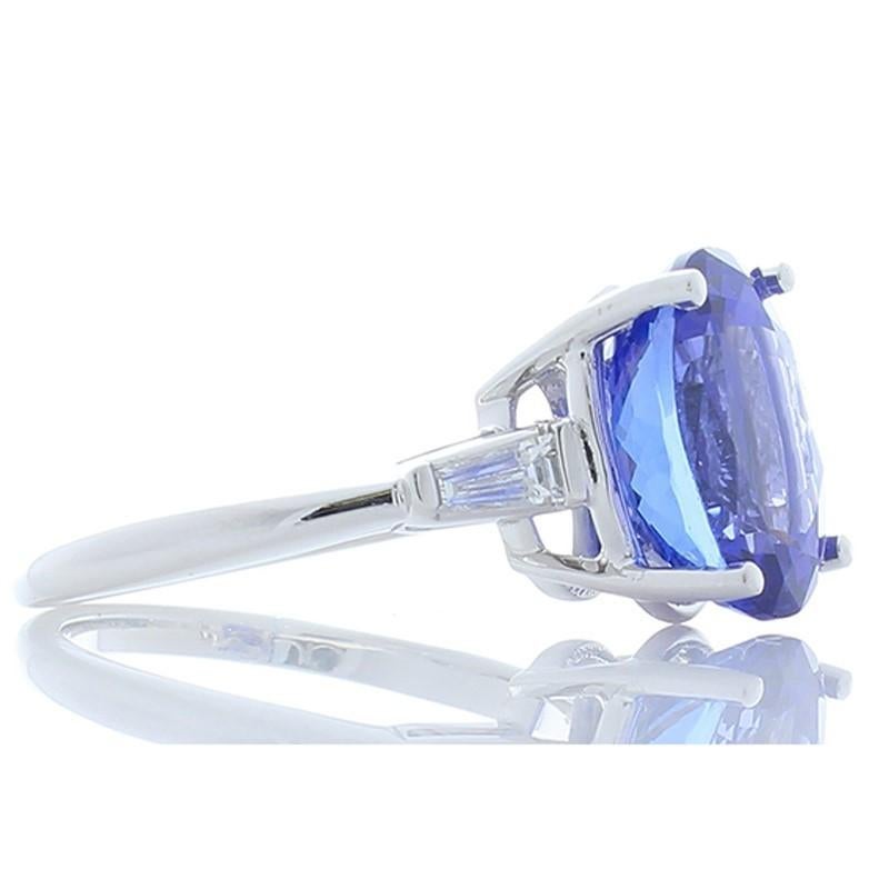 Oval Cut 6.00 Carat Oval Tanzanite and Tapered Baguette Diamond White Gold Cocktail Ring