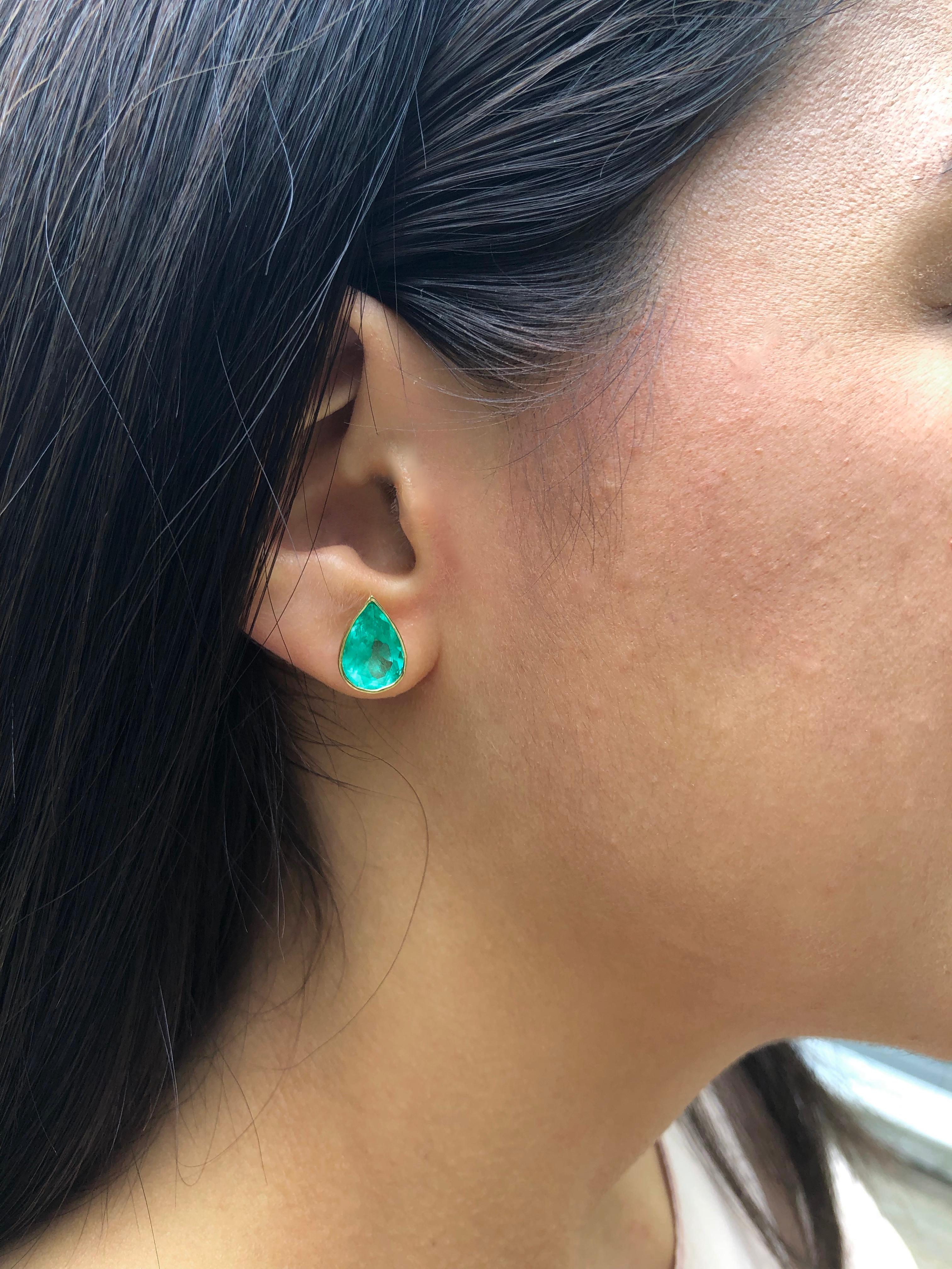 Pear Cut Natural Colombian Emerald Medium Green/ Clarity VS Total Weight Approx. 6.00 Carats Stud Earrings 
Earrings Measurement: 12.8mm x 9.2mm
Total Earrings Weight: 5g
Style: Bezel Set 18K Yellow Gold/ Push Backs
Condition: New
Comments: 100%