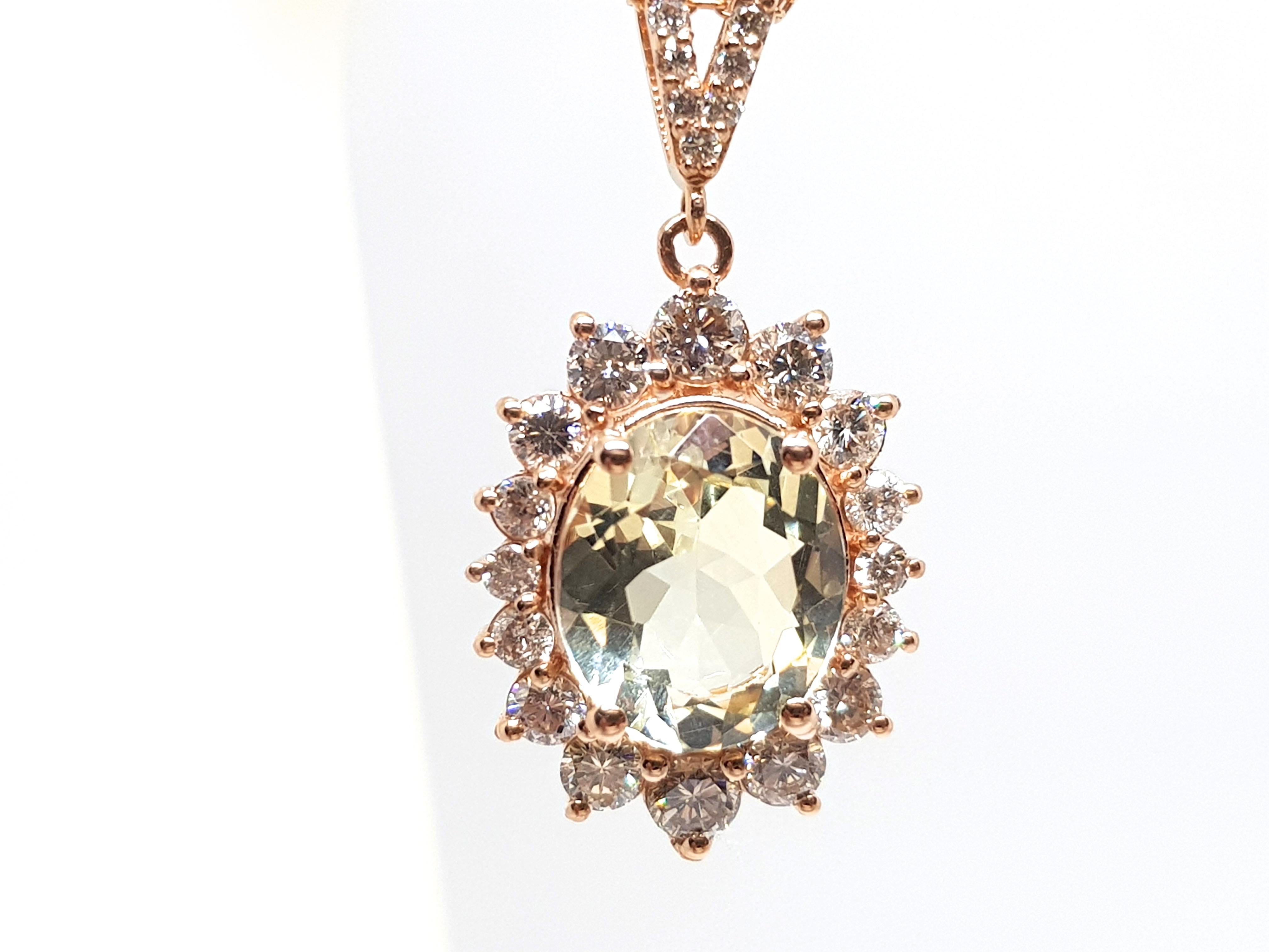 Gold: 18K Rose Gold. 
Weight: 5.56 gr. 
Diamonds: 1.97ct. Colour: G Clarity: VS 
Golden Beryl: 4.03ct. 
Length Pendant: 2.5 cm. 
Width Pendant: 1.3 cm. 
Length Necklace: choose between 40,42,45 or 50cm. 
All our jewellery comes with a certificate