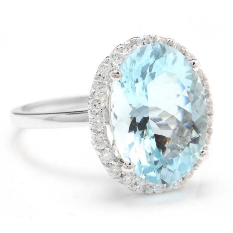 6.00 Carats Exquisite Natural Aquamarine and Diamond 14K Solid White Gold Ring

Total Aquamarine Weight is: Approx. 5.50 Carats

Aquamarine Measures: Approx. 14.00 x 10.00mm

Aquamarine Treatment: Heating

Natural Round Diamonds Weight: Approx. 0.50