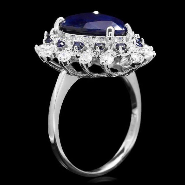 6.00 Carats Natural Blue Sapphire and Diamond 14K Solid White Gold Ring

Total Blue Sapphire Weight is: Approx. 5.50 Carats

Sapphire Measures: Approx. 12.00 x 10.00mm (1 pear)

Sapphire Measures: Approx. 1.7 mm (12 Round)

Sapphire treatment: