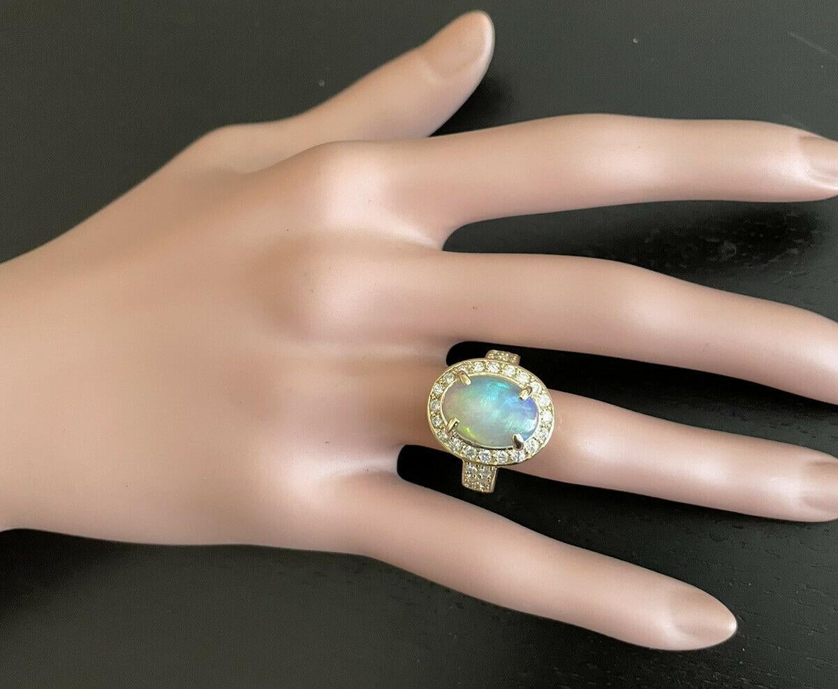 6.00 Carats Natural Ethiopian Opal and Diamond 14k Solid Yellow Gold Ring In New Condition For Sale In Los Angeles, CA