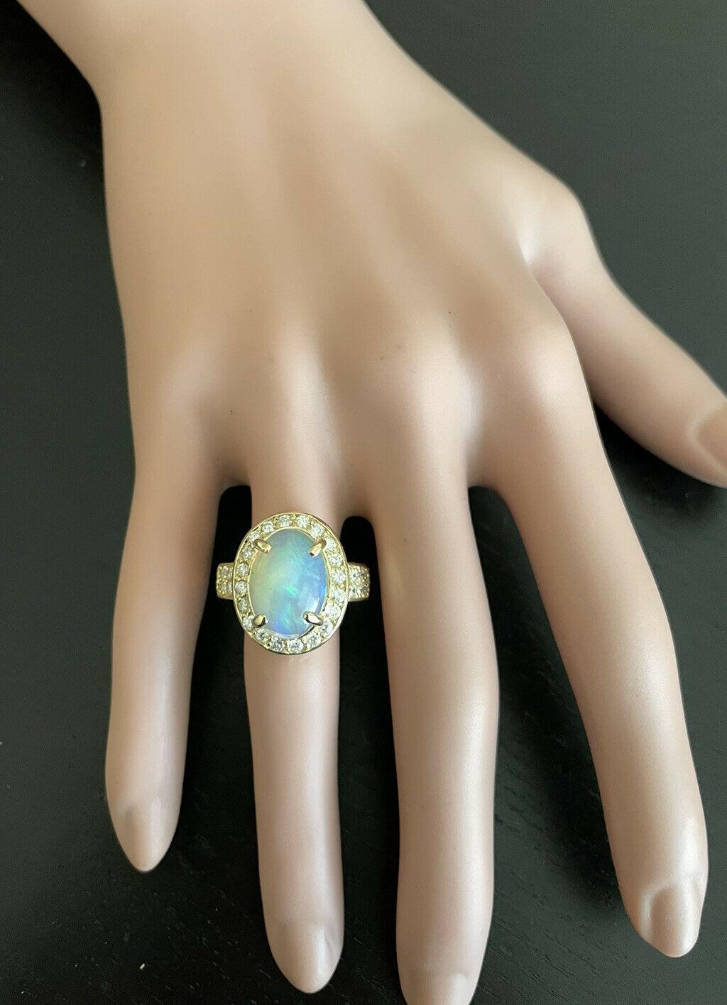 6.00 Carats Natural Ethiopian Opal and Diamond 14K Solid Yellow Gold Ring In New Condition For Sale In Los Angeles, CA