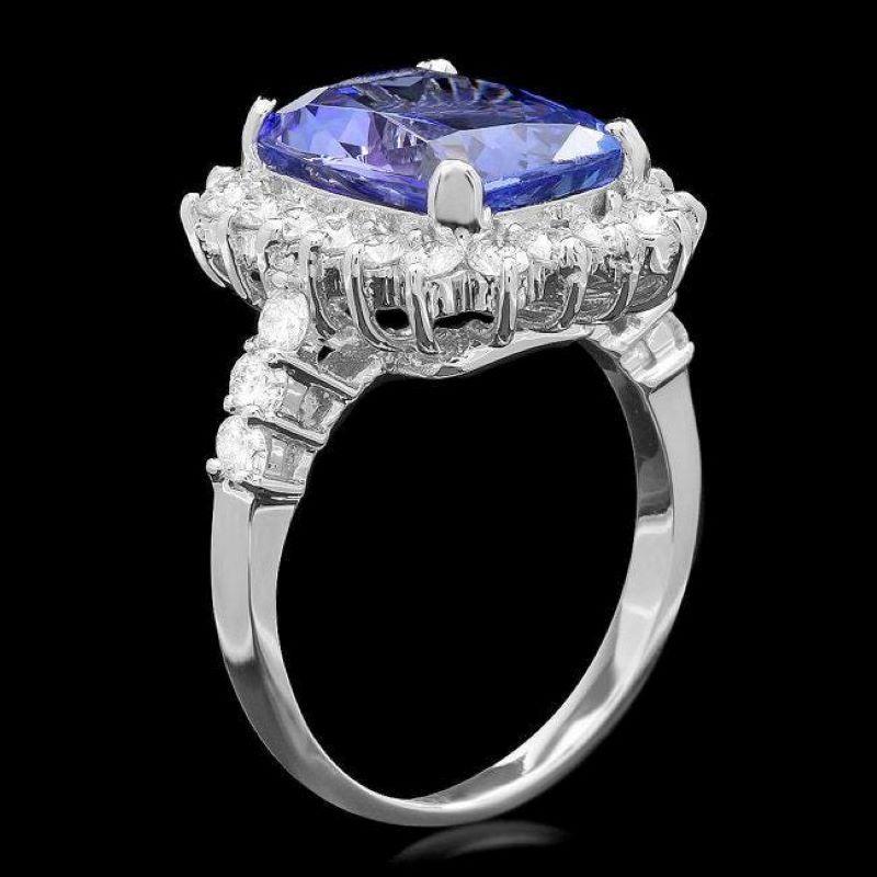 6.00 Carats Natural Tanzanite and Diamond 14K Solid White Gold Ring

Total Natural Tanzanite Weight is: Approx. 4.90 Carats 

Tanzanite Measures: Approx. 12.00 x 9.00mm

Natural Round Diamonds Weight: Approx. 1.10 Carats (color G-H / Clarity