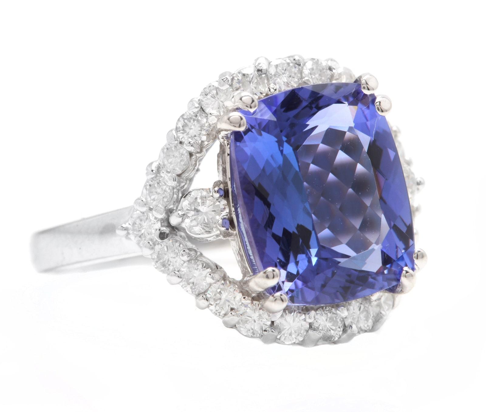 6.00 Carats Natural Very Nice Looking Tanzanite and Diamond 18K Solid White Gold Ring

Suggested Replacement Value: Approx.  $8,800.00

Total Natural Cushion Cut Tanzanite Weight is: Approx. 5.00 Carats 

Tanzanite Measures: Approx. 11 x 9mm
