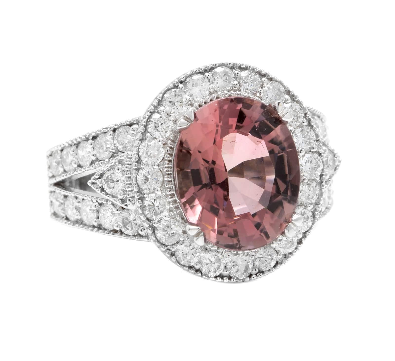 6.00 Carats Natural Very Nice Looking Tourmaline and Diamond 14K Solid White Gold Ring

Total Natural Oval Cut Tourmaline Weight is: Approx. 4.50 Carats

Tourmaline Measures: Approx. 12.00 x 10.00mm

Natural Round Diamonds Weight: Approx. 1.50