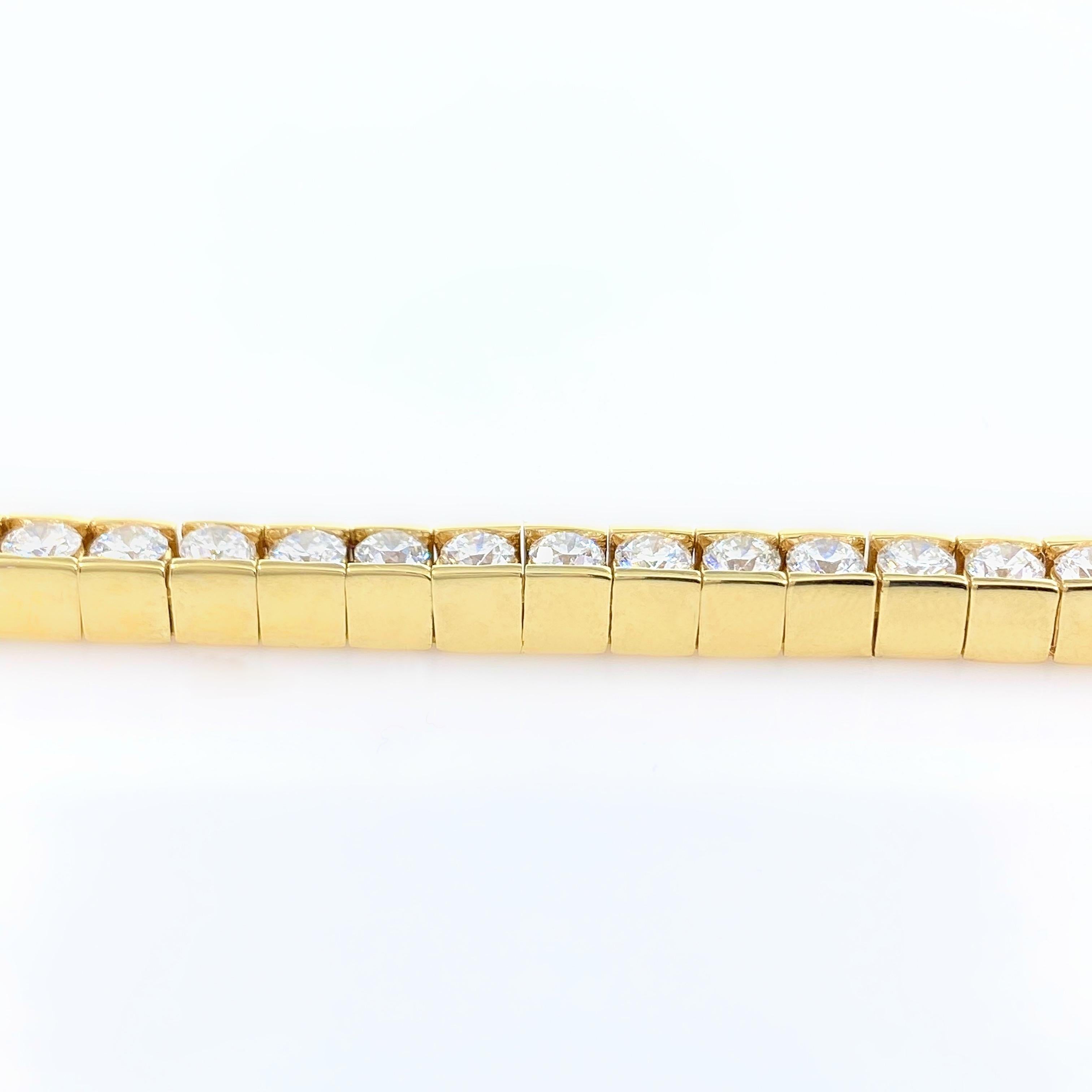 Diamond Tennis Bracelet
Style:  Channel-Set
Metal:  14 kt Yellow Gold
Weight:  20 grams
Size:  7' Inches / 4 MM
TCW:  6.00 tcw
Main Diamond:  56 Round Brilliant Diamonds
Color & Clarity:  H / VS2 - SI1
Hallmark:  14K
Includes:  Certified Appraisal -