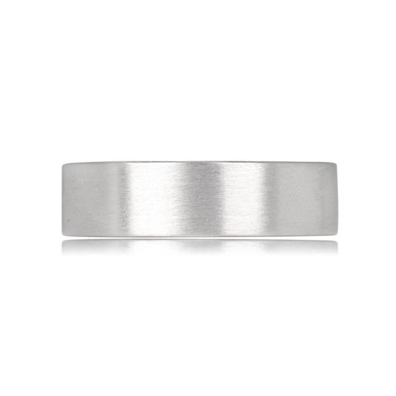 An exquisitely handcrafted platinum wedding band, 6mm in width, designed with a comfortable fit and adorned with a sophisticated brushed finish. Unlike castings, this band is a testament to meticulous craftsmanship, ensuring a unique and refined