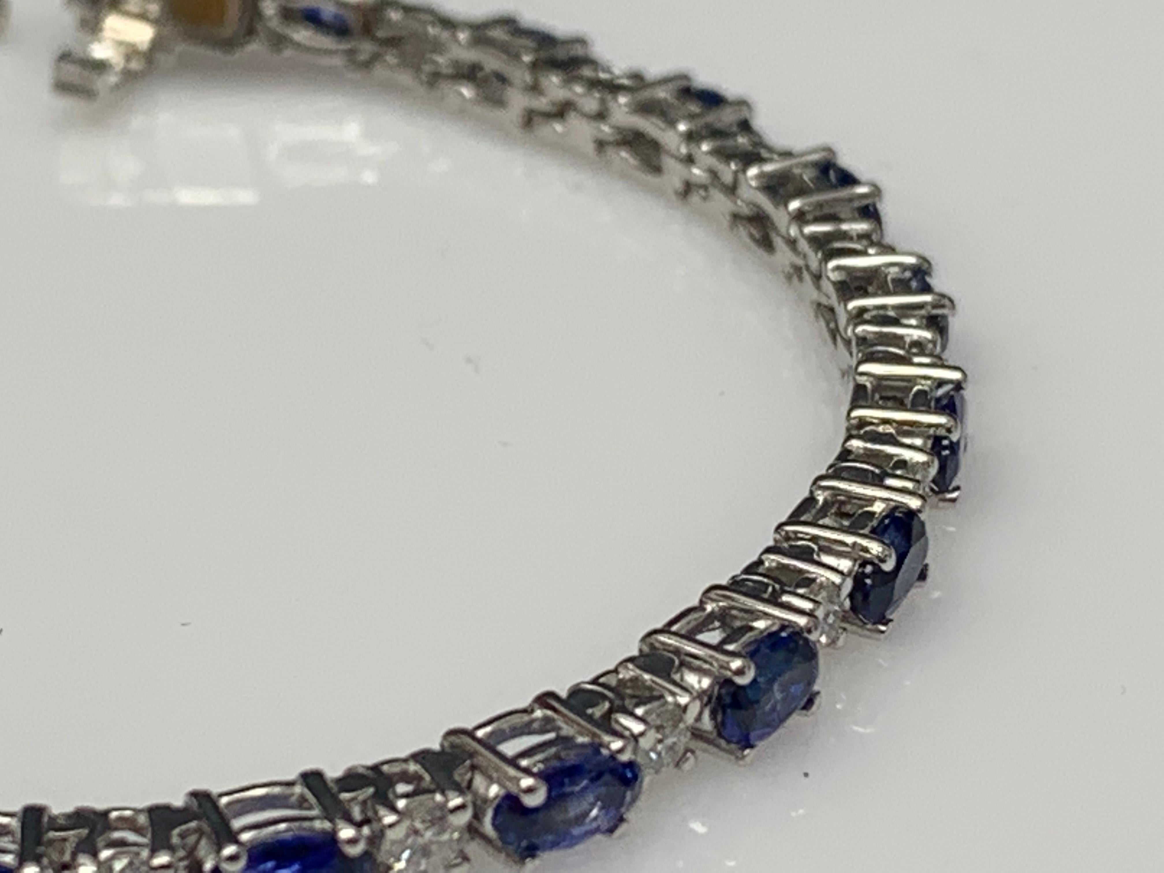 Oval Cut 6.01 Carat Blue Sapphire and Diamond Tennis Bracelet in 14K White Gold For Sale