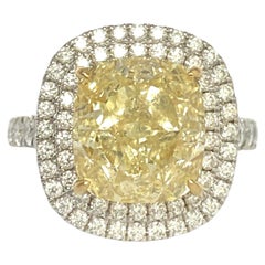 6.01 carat GIA Certified Natural Fancy Light Yellow Cushion Cut Diamond Ring
