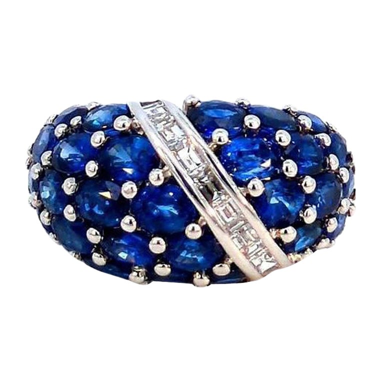 Anillo de platino con zafiro azul natural de 6,01 quilates y racimo de diamantes