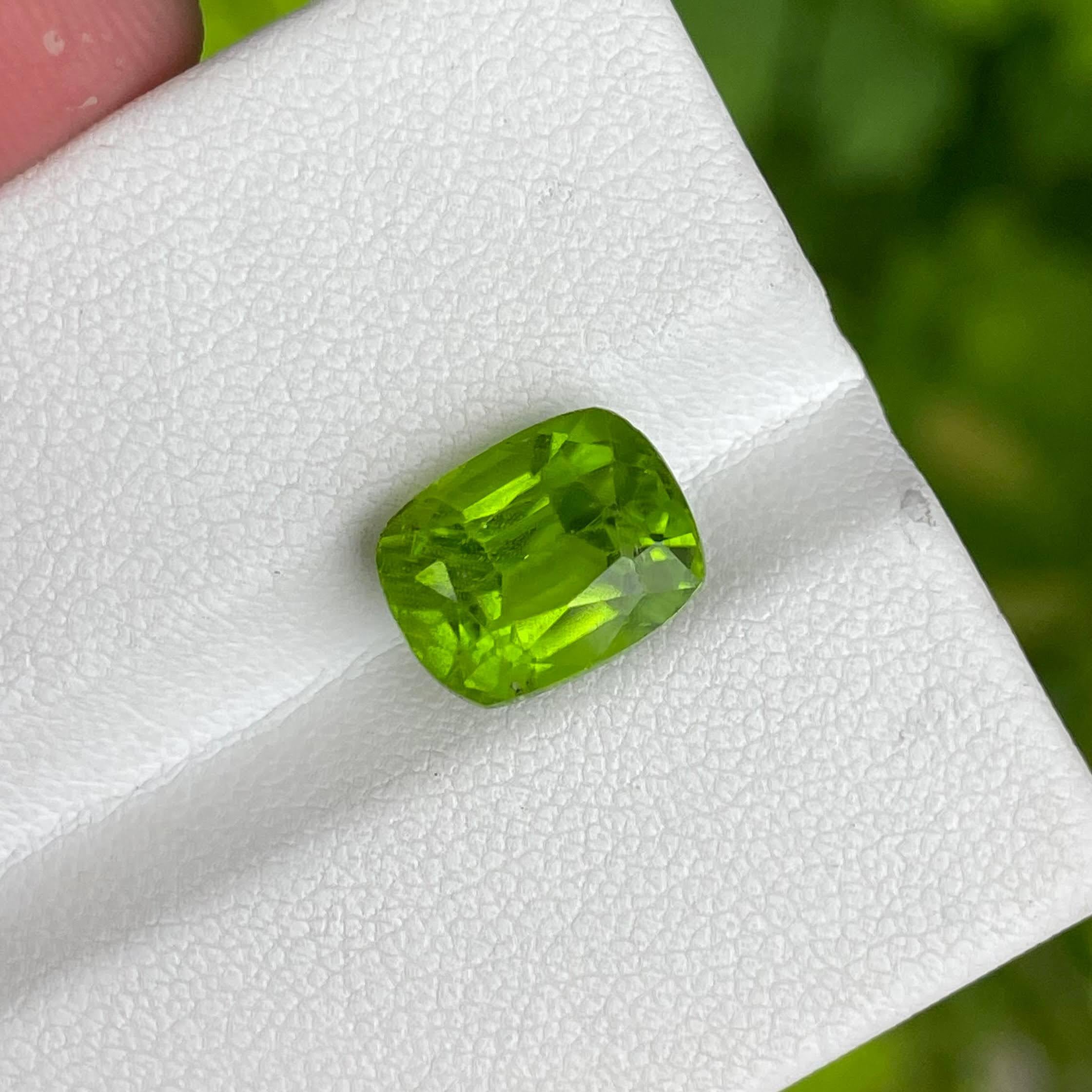Weight 6.01 carats 
Dimensions 10.9x8.5x8.0 mm
Treatment none 
Origin Pakistan 
Clarity included 
Shape cushion 
Cut fancy cushion 



Behold the mesmerizing beauty of a 6.01 carat Green Peridot Stone, expertly crafted into an cushion cut,