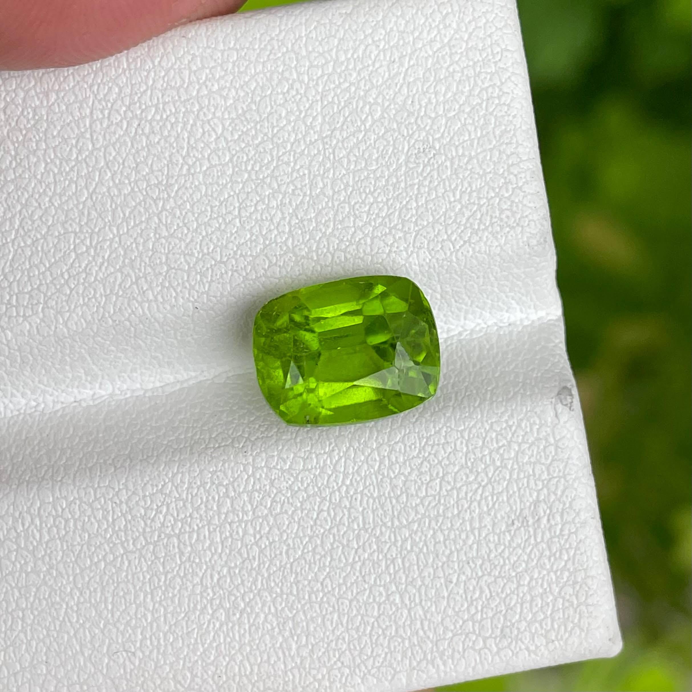 Modern 6.01 Carats Green Loose Peridot Stone Cushion Cut Natural Pakistani Gemstone For Sale