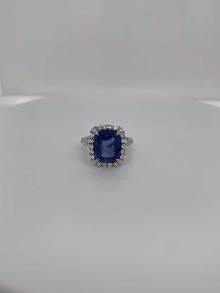 Cushion blue sapphire weighing 6.02 cts.
Measuring (11.8x9.9) mm
34 pieces of diamonds weighing .75 cts.
Set in 18K white gold ring