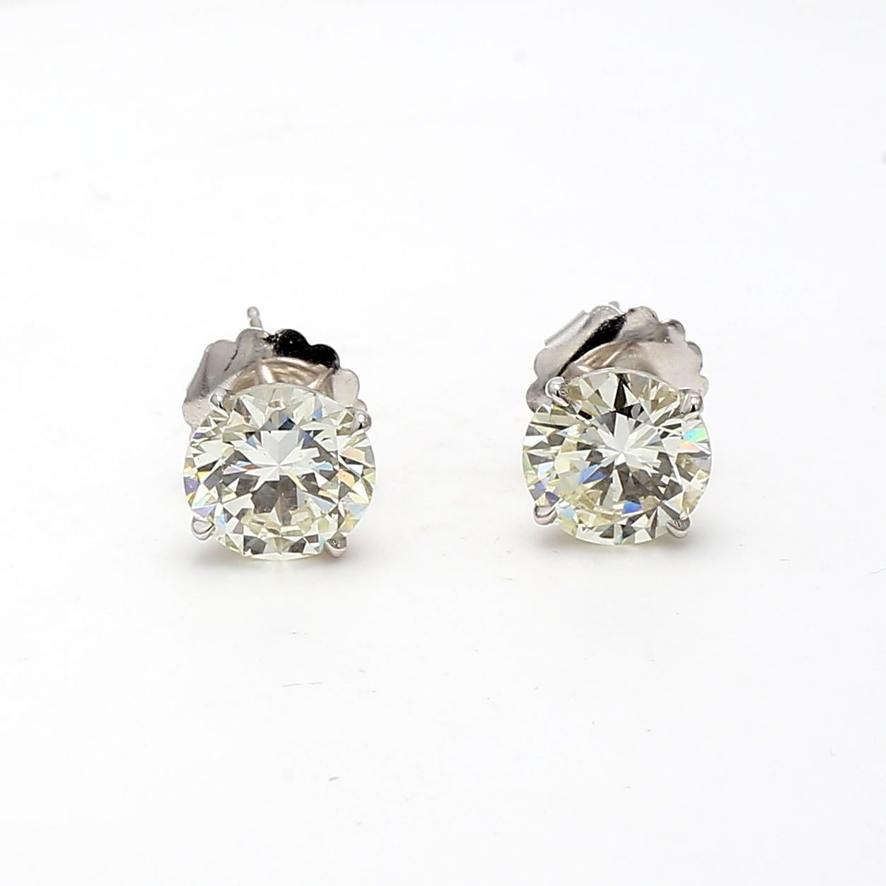 Title:
6.02 Carat Old European Cut N-R VS2-SI1 Diamond 14 Karat White Gold Stud Earrings


Style:
Stud


Metal:
14 Karat White Gold


Gemstone 1:
2.91 Carat Diamond


Number of Stones:
1


Color:
N


Clarity:
VS2


Shape:
Old European
