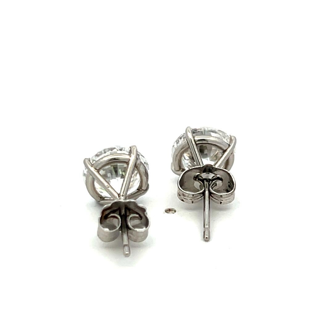 Orecchini con diamante brillante rotondo 6,02ct D SI1 in oro bianco 18 carati (GIA) in vendita 7