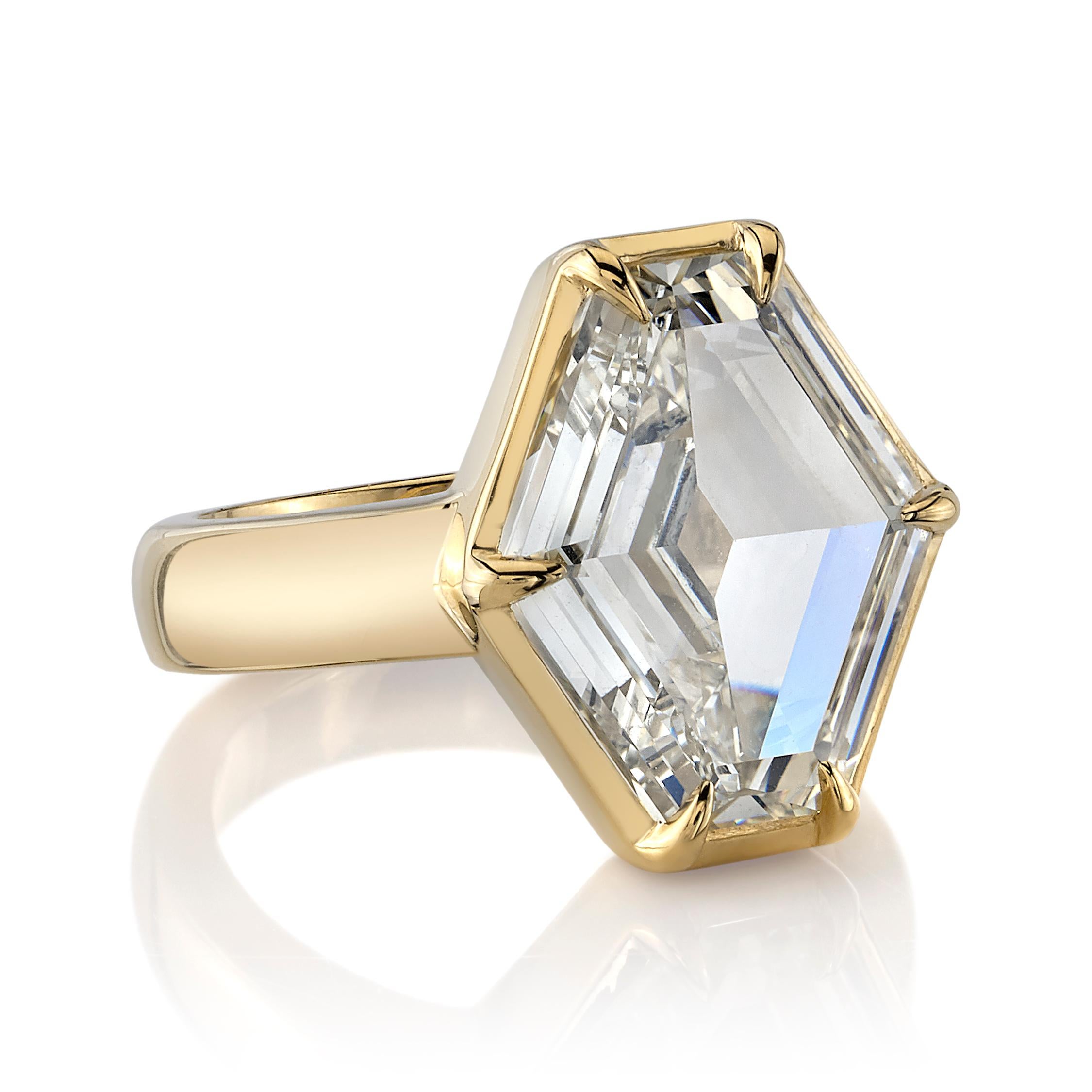 6.02ctw N/VS1 GIA certified Hexagonal Step cut diamond set in a handcrafted 18K yellow gold ring. 

Ring is currently size 6. Please contact us about potential re-sizing.

Our jewelry is made locally in Los Angeles and most pieces are made to order.