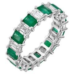 6.03 Carat Colombian Emerald cut Emerald 
Natural Diamond Band.