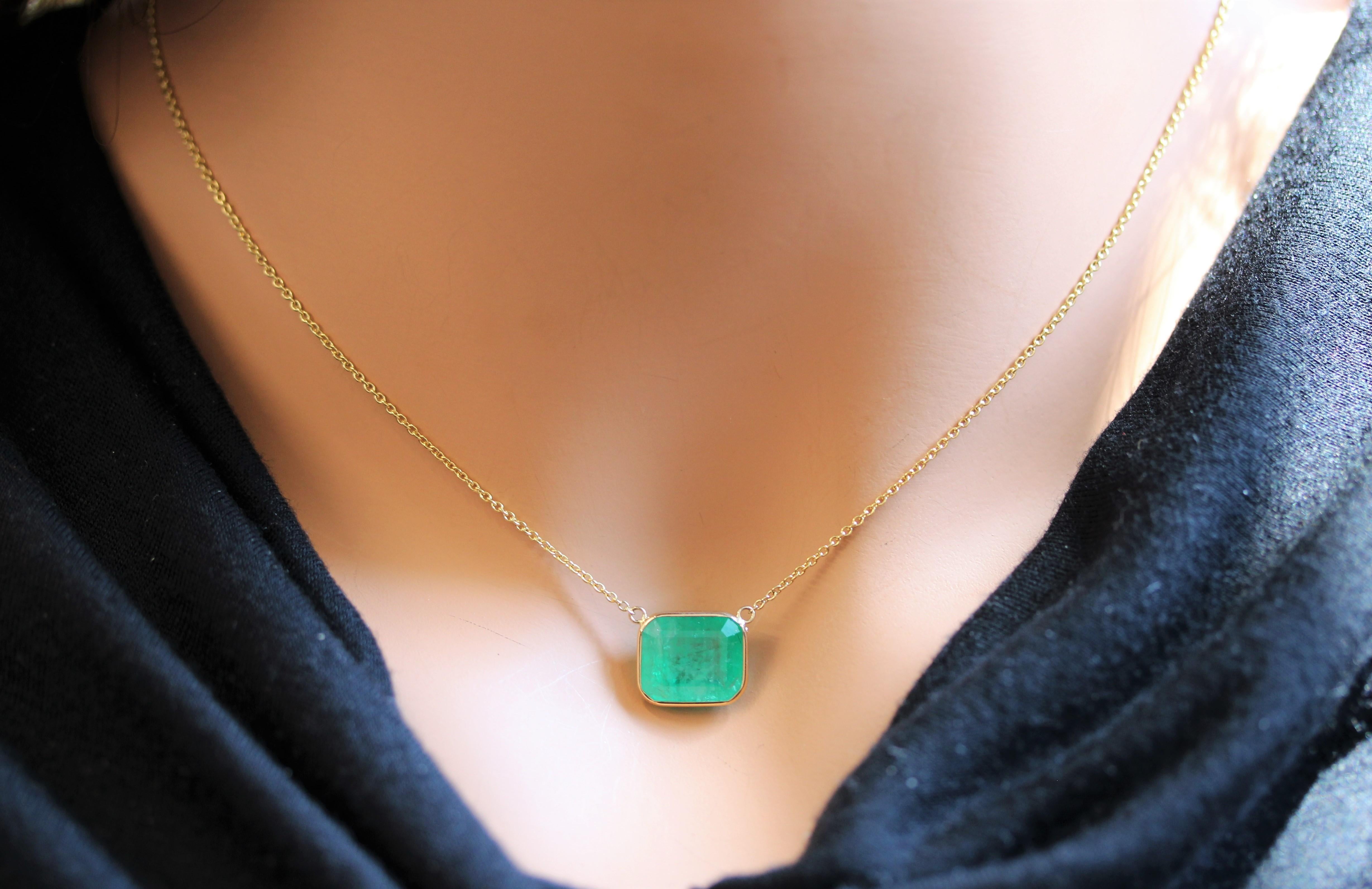 Emerald Cut 6.03 Carat Green Emerald Delicate Handmade Solitaire Necklace In 14k Yellow Gold For Sale