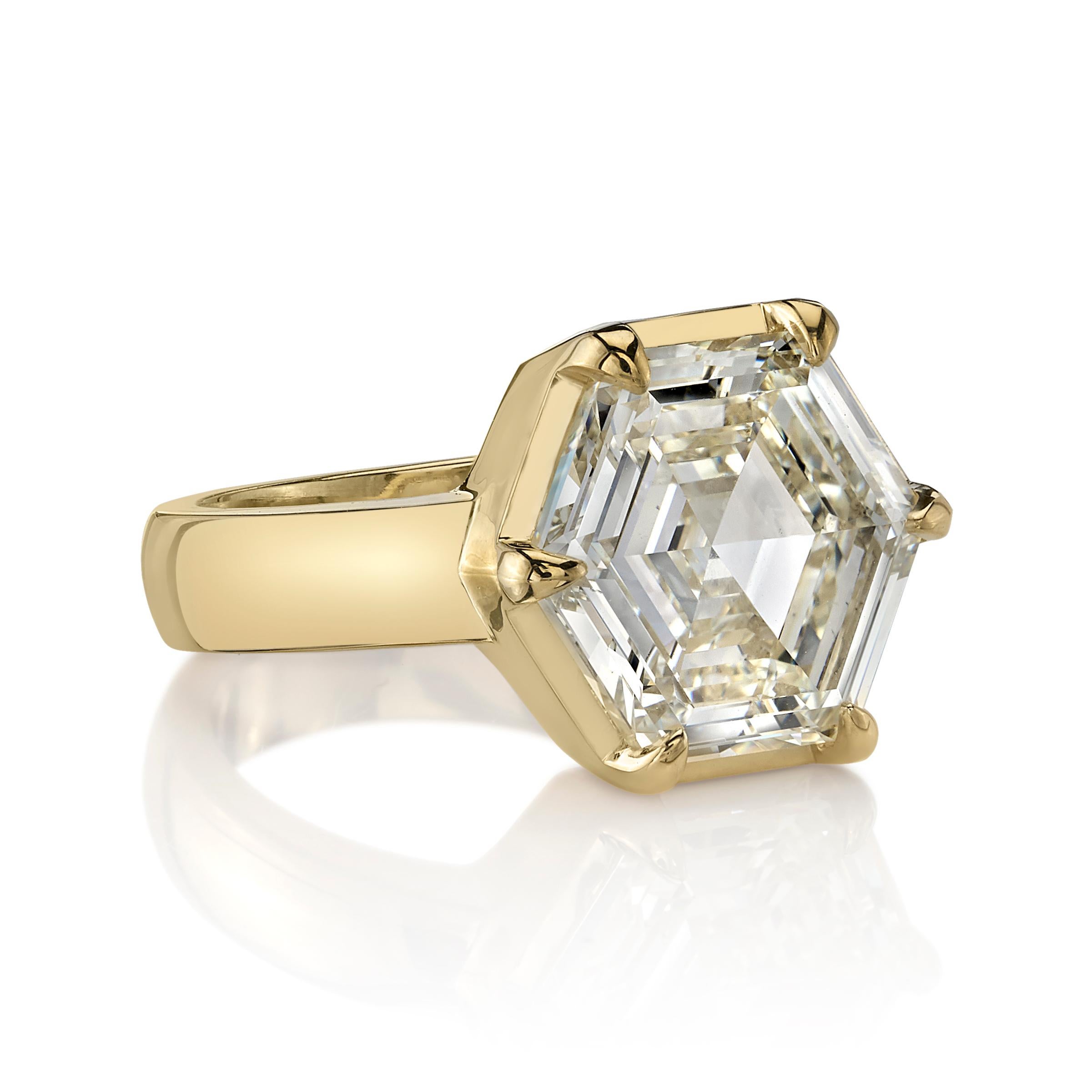 6.03ctw M/VS1 GIA certified Hexagonal step cut diamond set in a handcrafted 18K yellow gold ring.

Ring is currently a size 6 and can be sized to fit. 

Our jewelry is made locally in Los Angeles and most pieces are made to order. For these