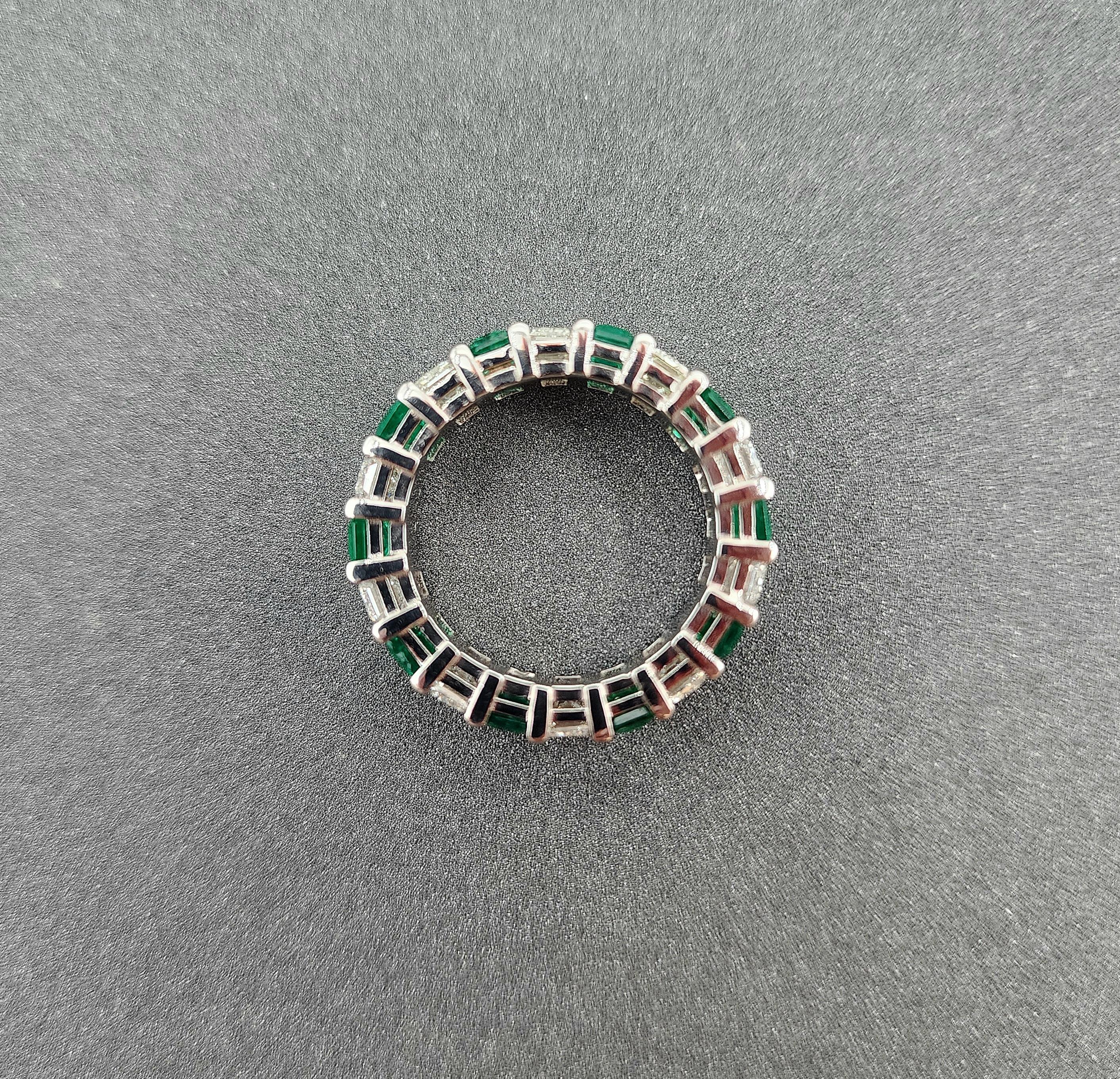 Exquisite 6.03 Carat Colombian Emerald & Diamond Eternity Band In New Condition For Sale In Chicago, IL
